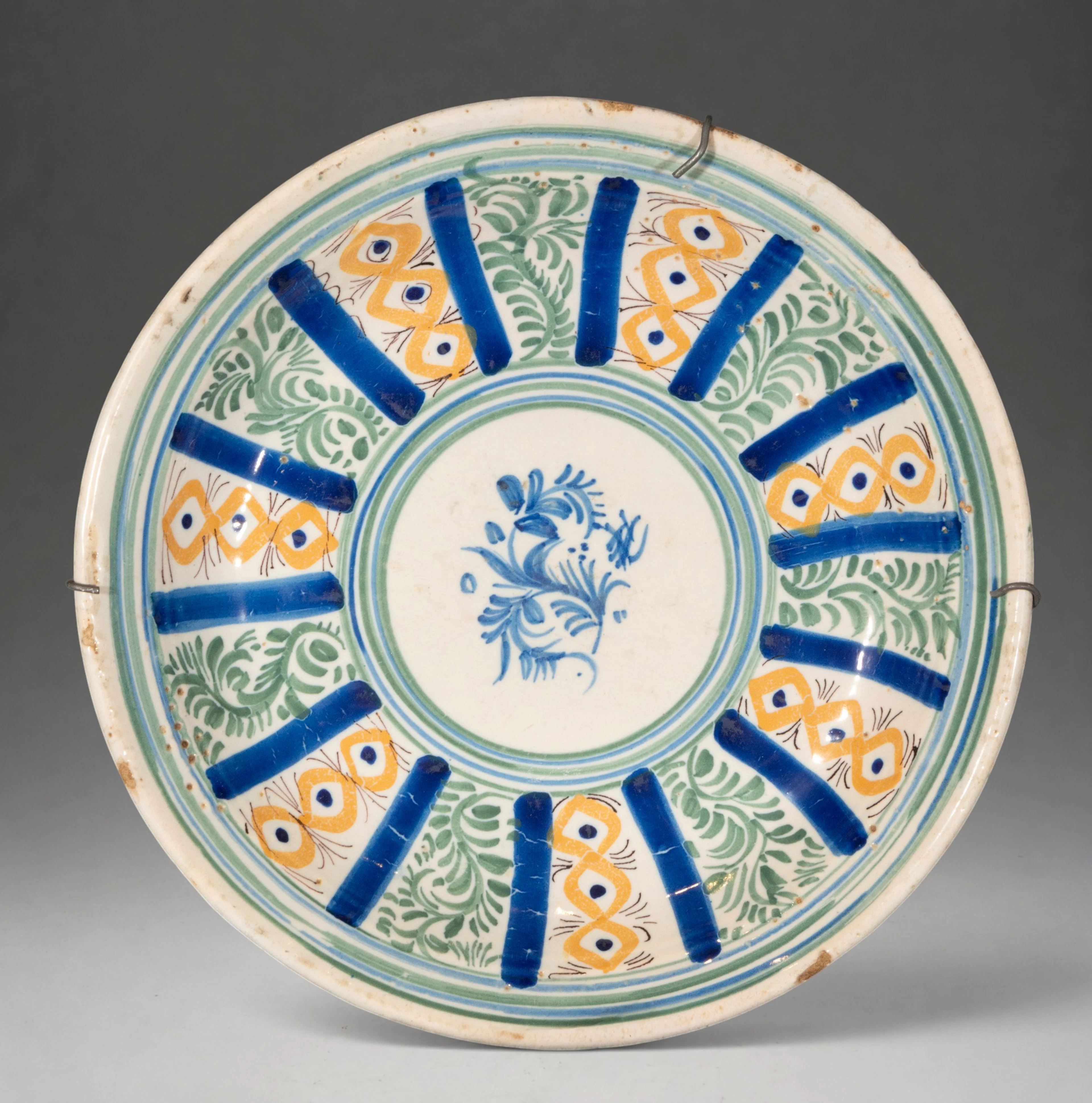 MANISES CERAMICS - Plate with polychrome floral and geometric decoration