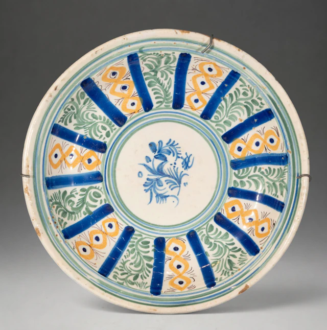 MANISES CERAMICS - Plate with polychrome floral and geometric decoration