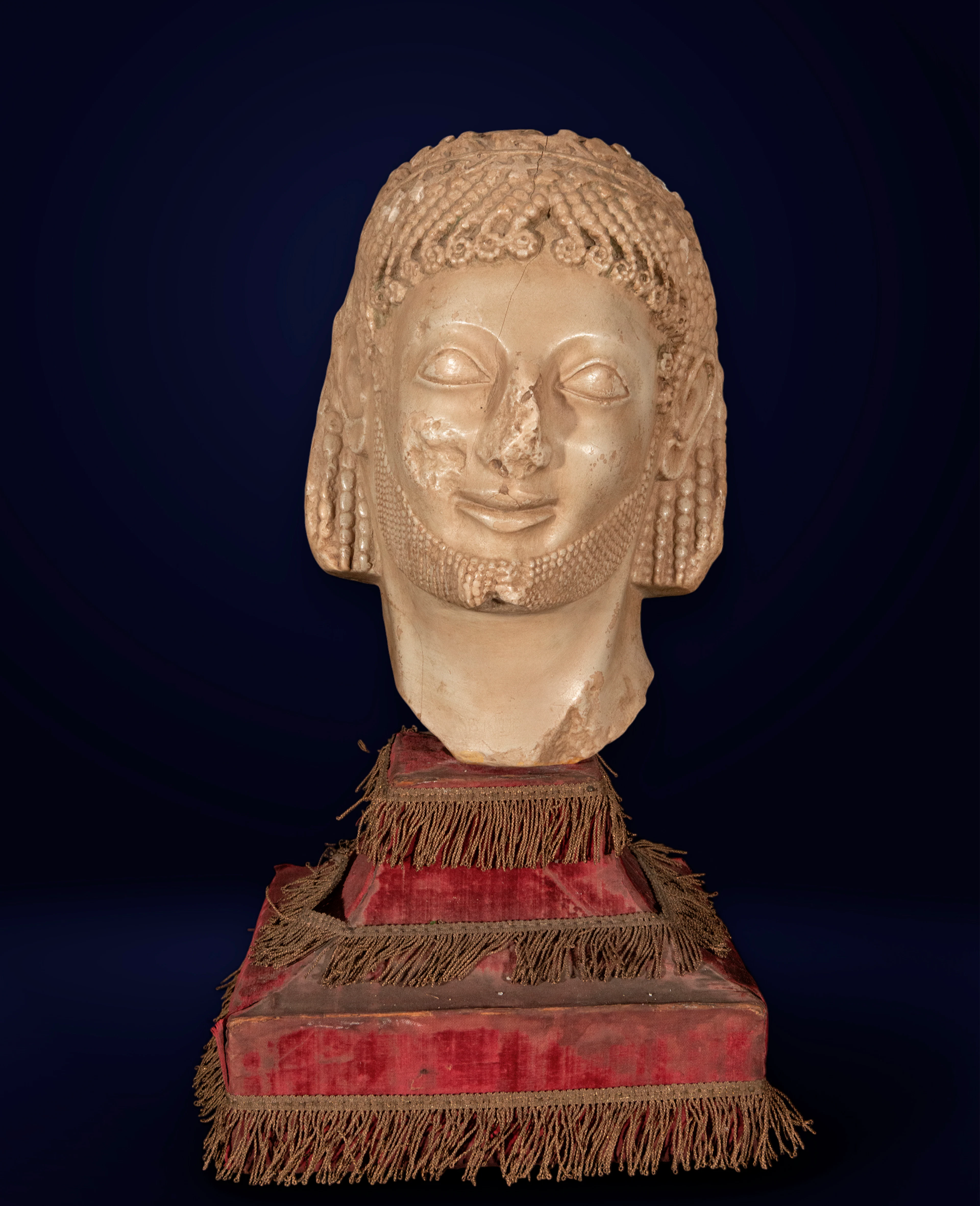 Decorative Etruscan Hellenistic style head in white marble powder