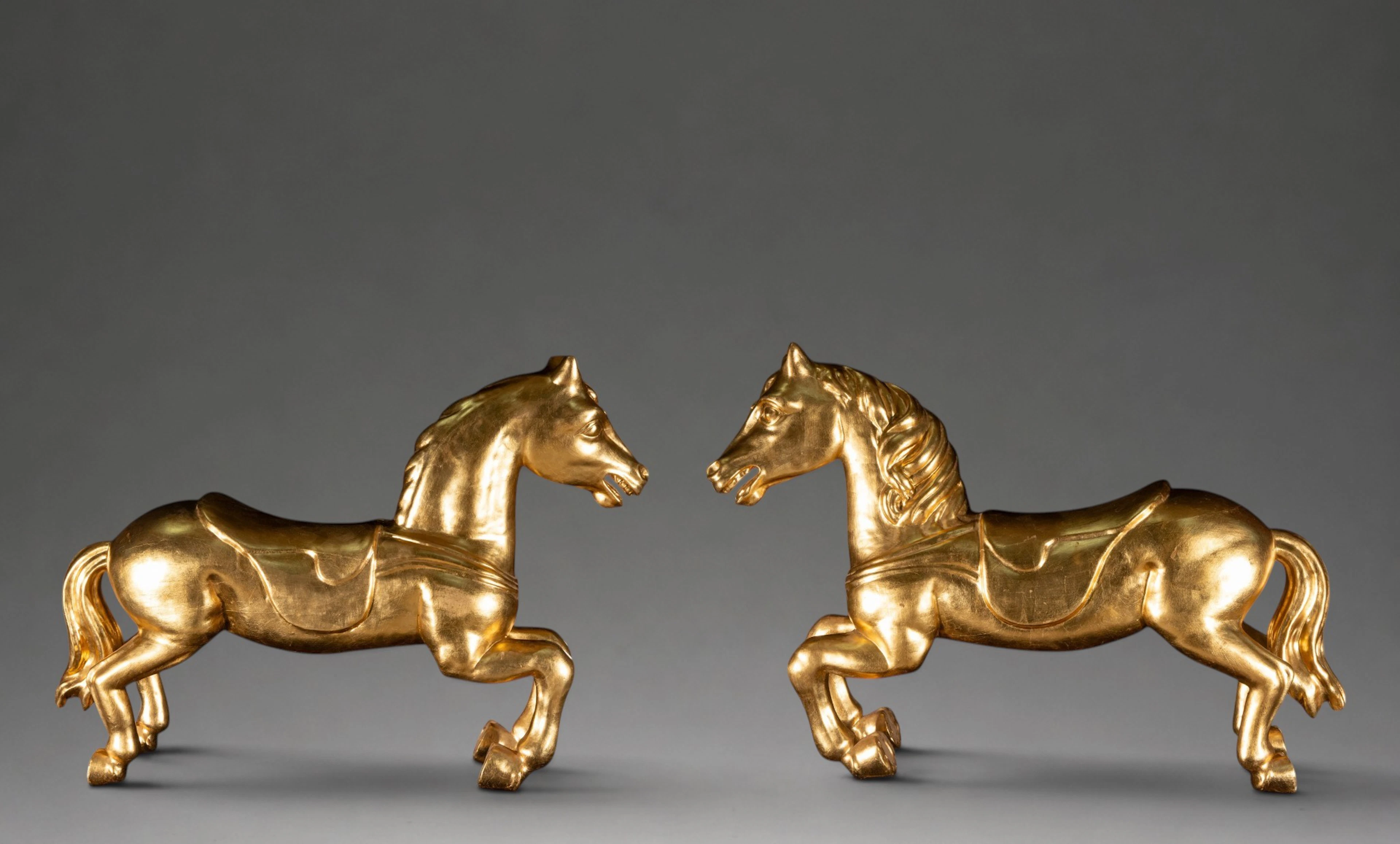 Pair of golden carousel horses – European School – first half of the