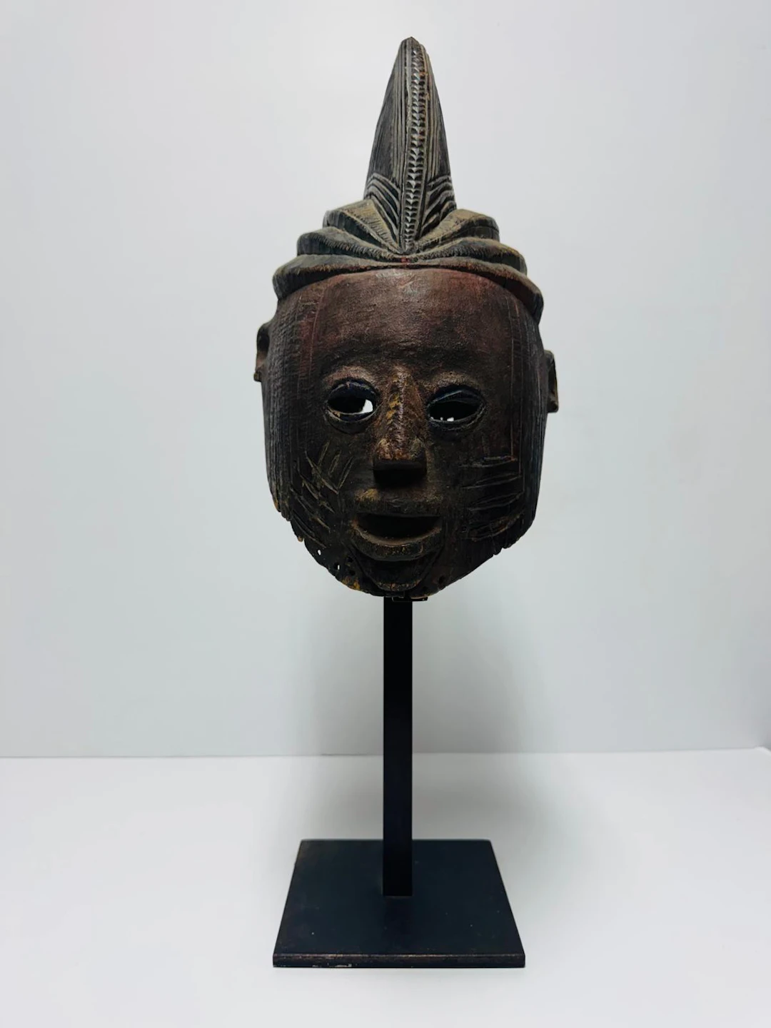EXCEPTIONAL AND ANCIENT 19TH-CENTURY YORUBA AFRICAN MASK