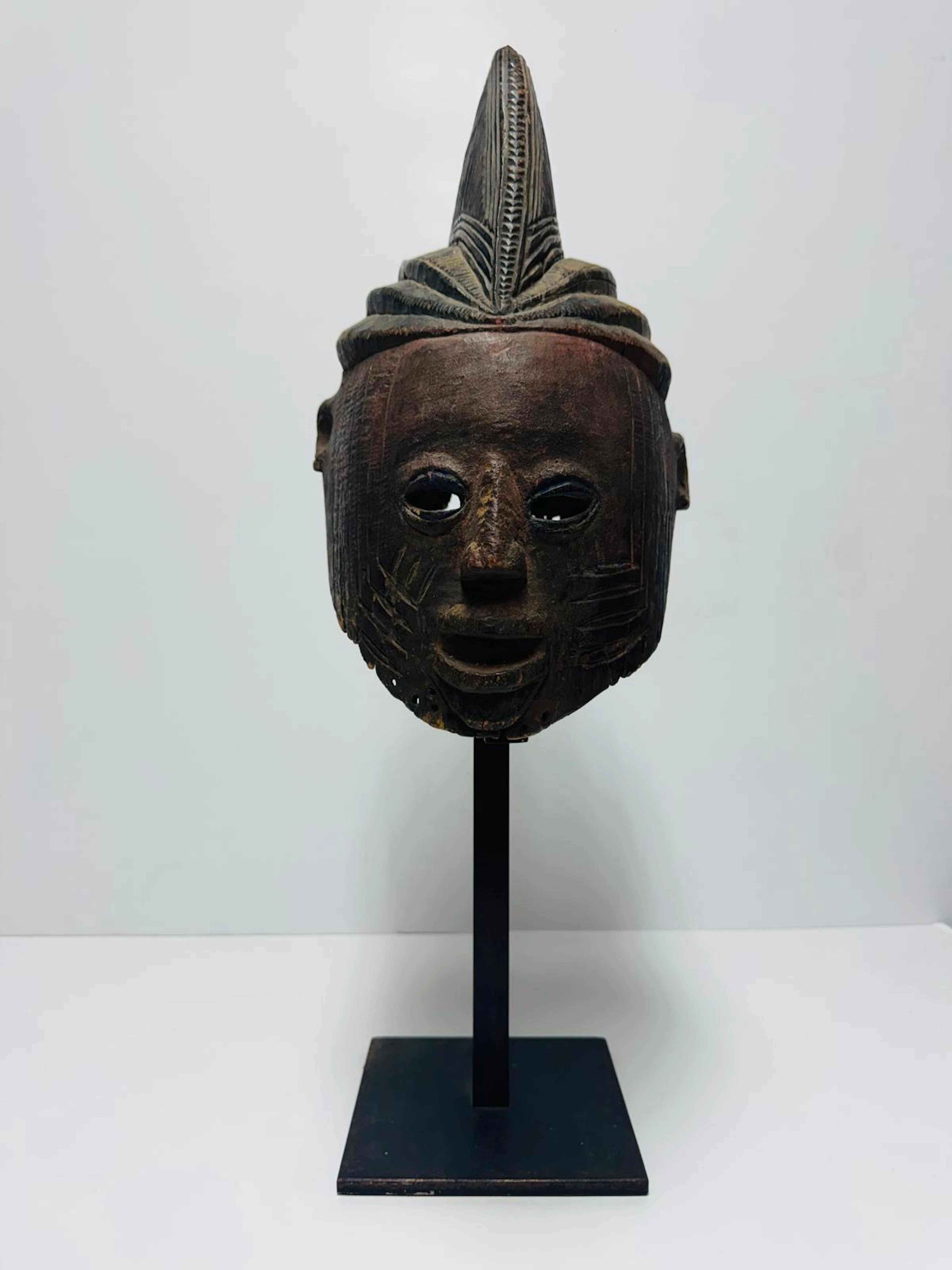 EXCEPTIONAL AND ANCIENT 19TH-CENTURY YORUBA AFRICAN MASK