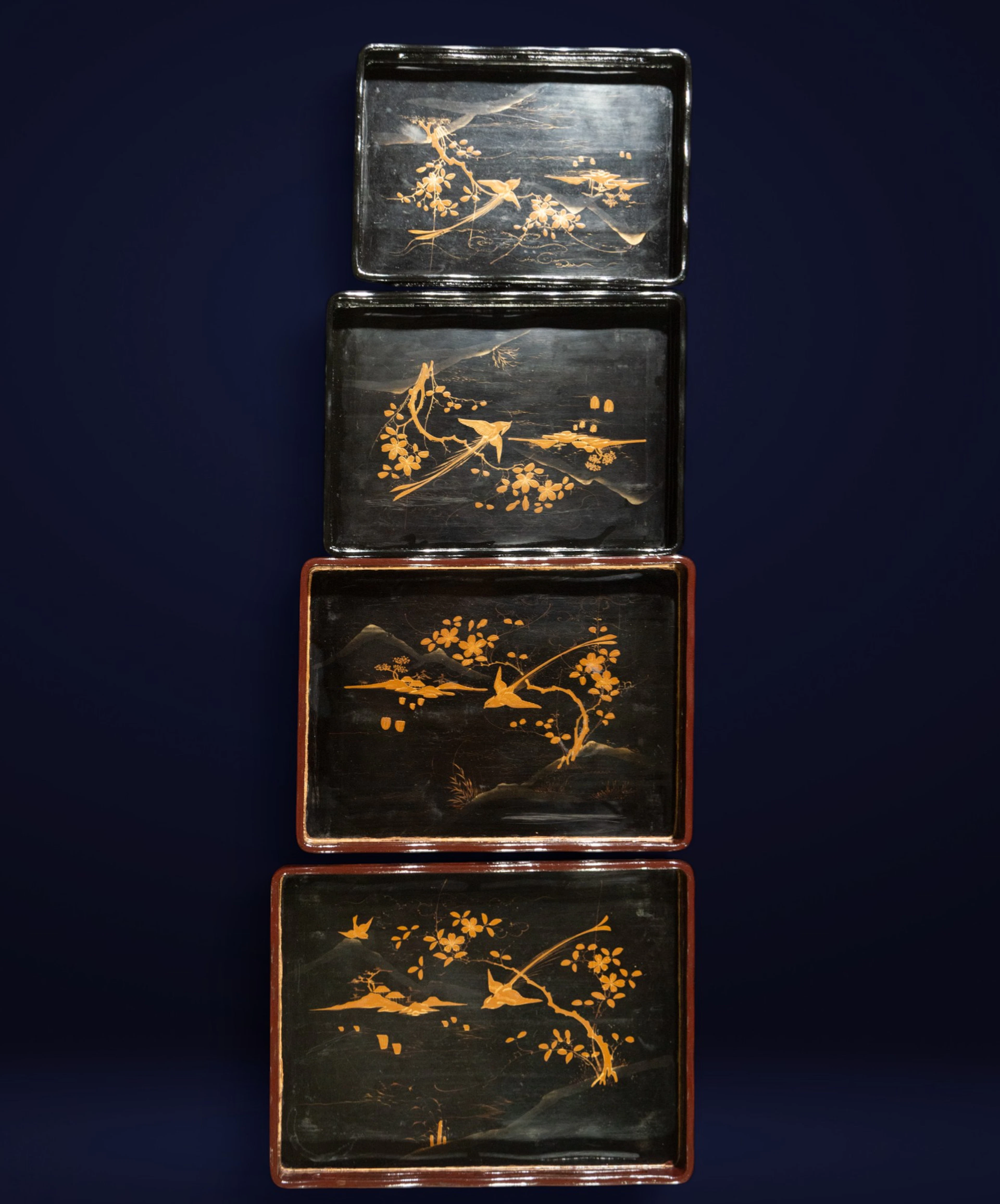 Set of lacquered trays with oriental motifs, Japan, 20th century