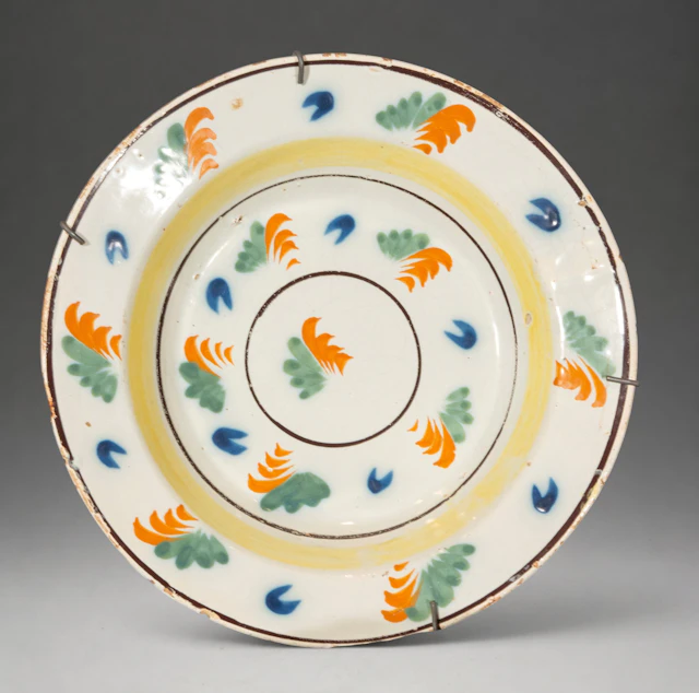 MANISES CERAMICS - Plate with polychrome plant decoration