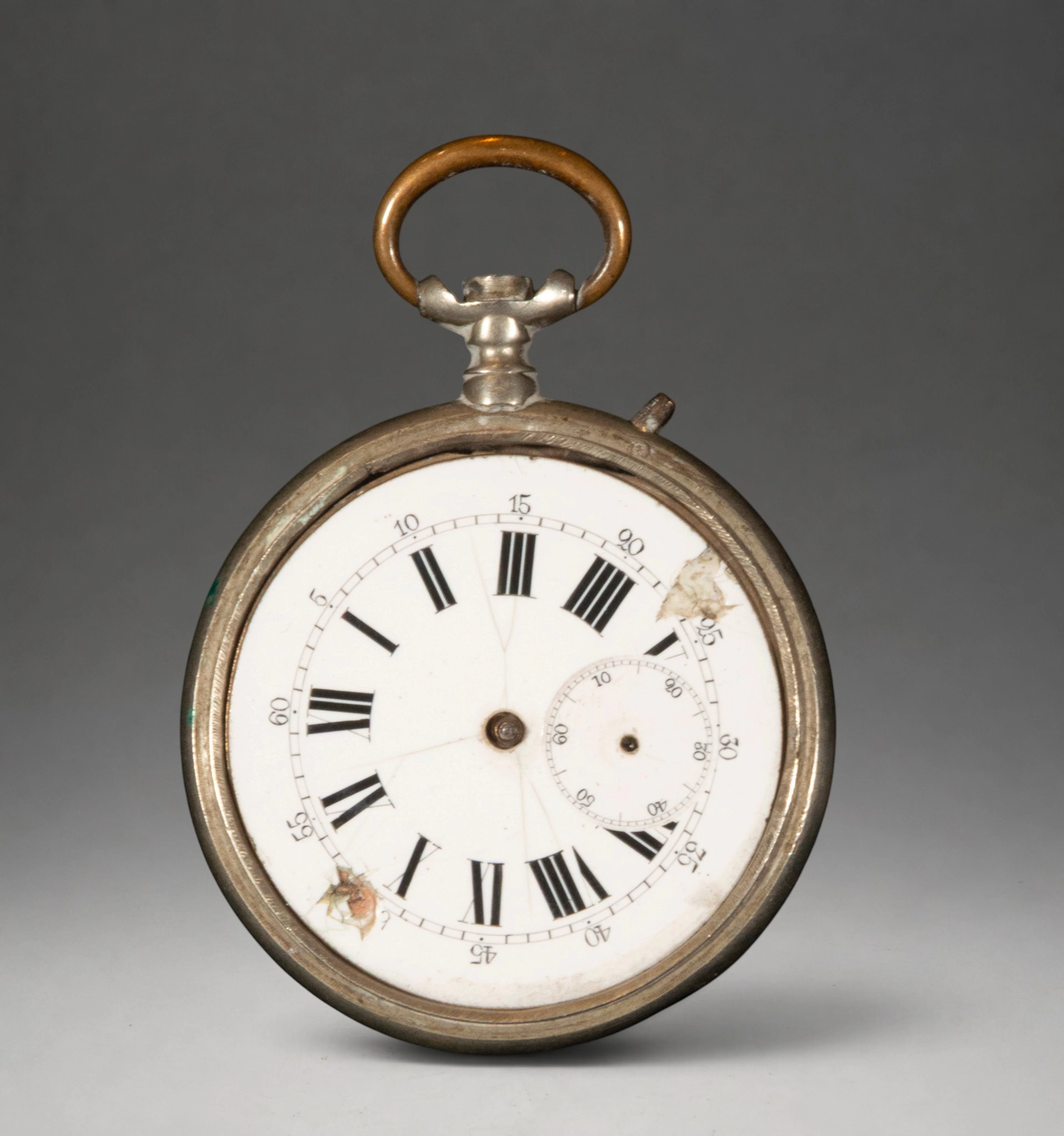 Gold pocket watch with white dial