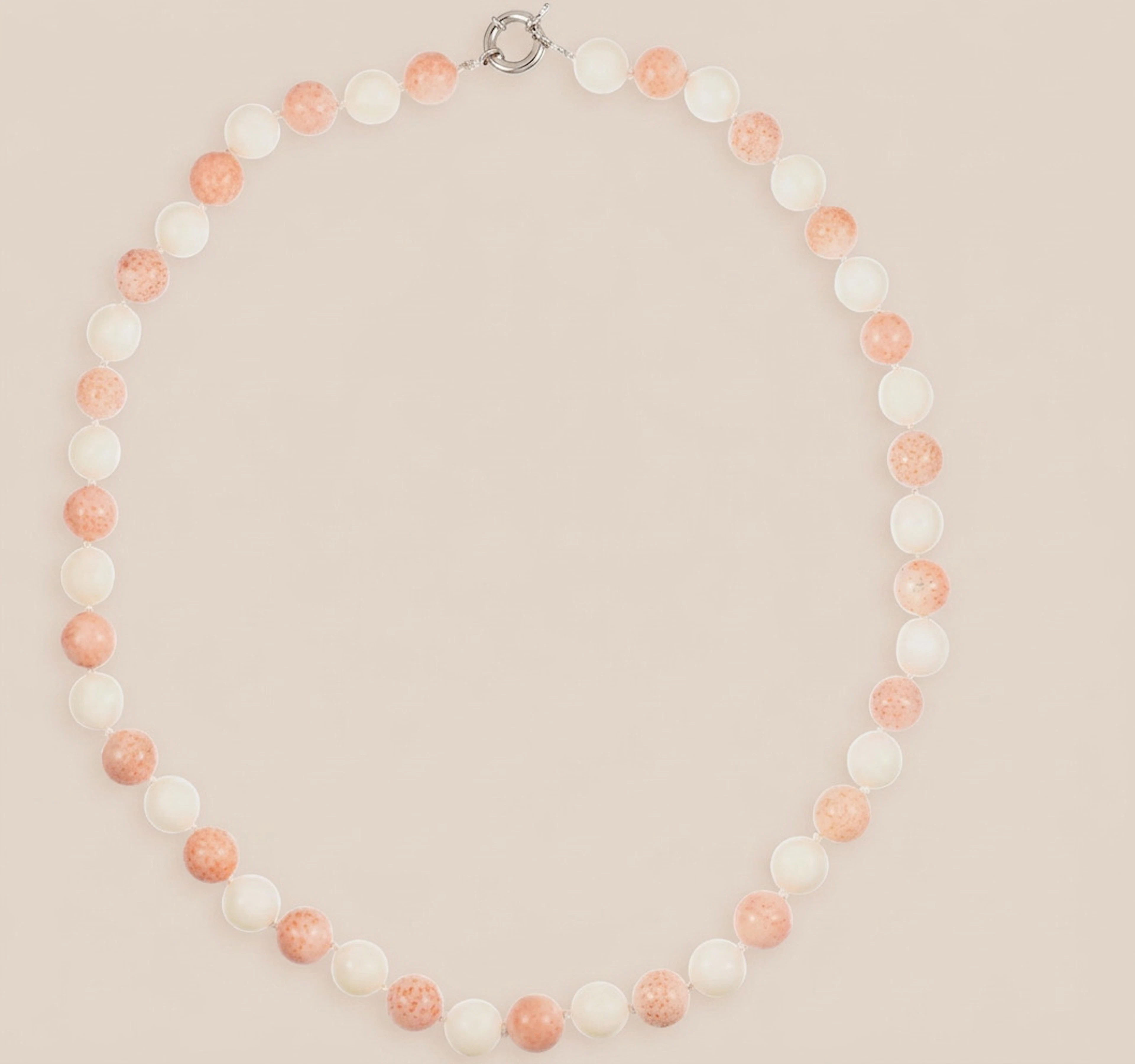 Necklace of white coral beads and angel skin coral, 20th century