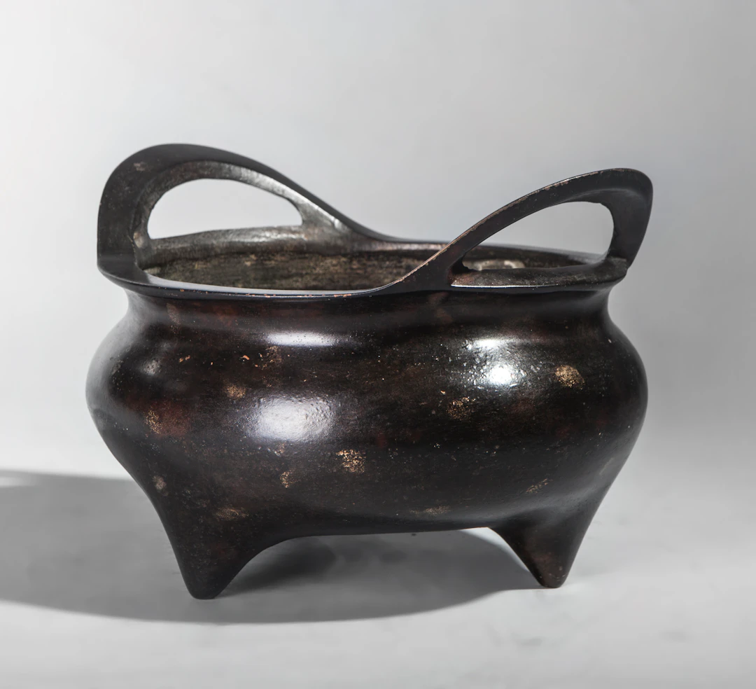 Bronze incense burner, China. On the base, a six-character Ming inscription