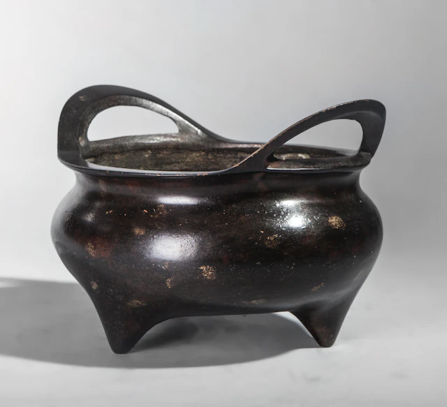 Bronze incense burner, China. On the base, a six-character Ming inscription