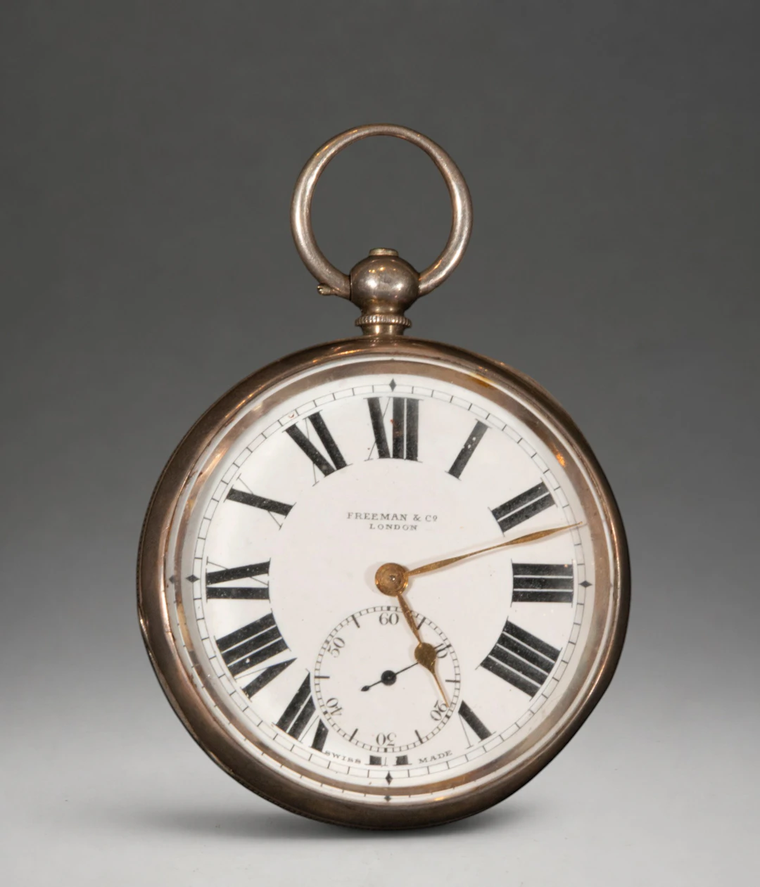 Pocket watch with Arabic numerals and subsidiary seconds hand