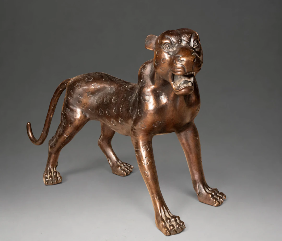 Pair of bronze panthers – China – 19th century