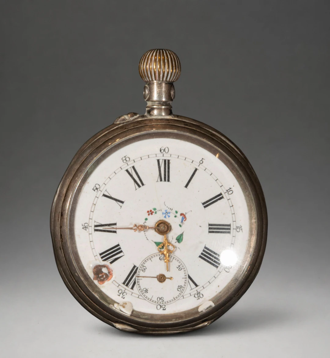 Pocket watch with Roman numeral dial