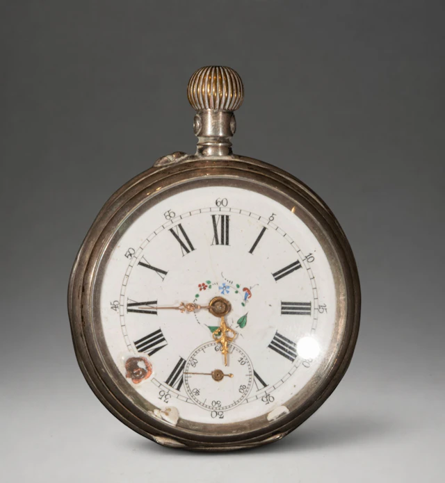 Pocket watch with Roman numeral dial