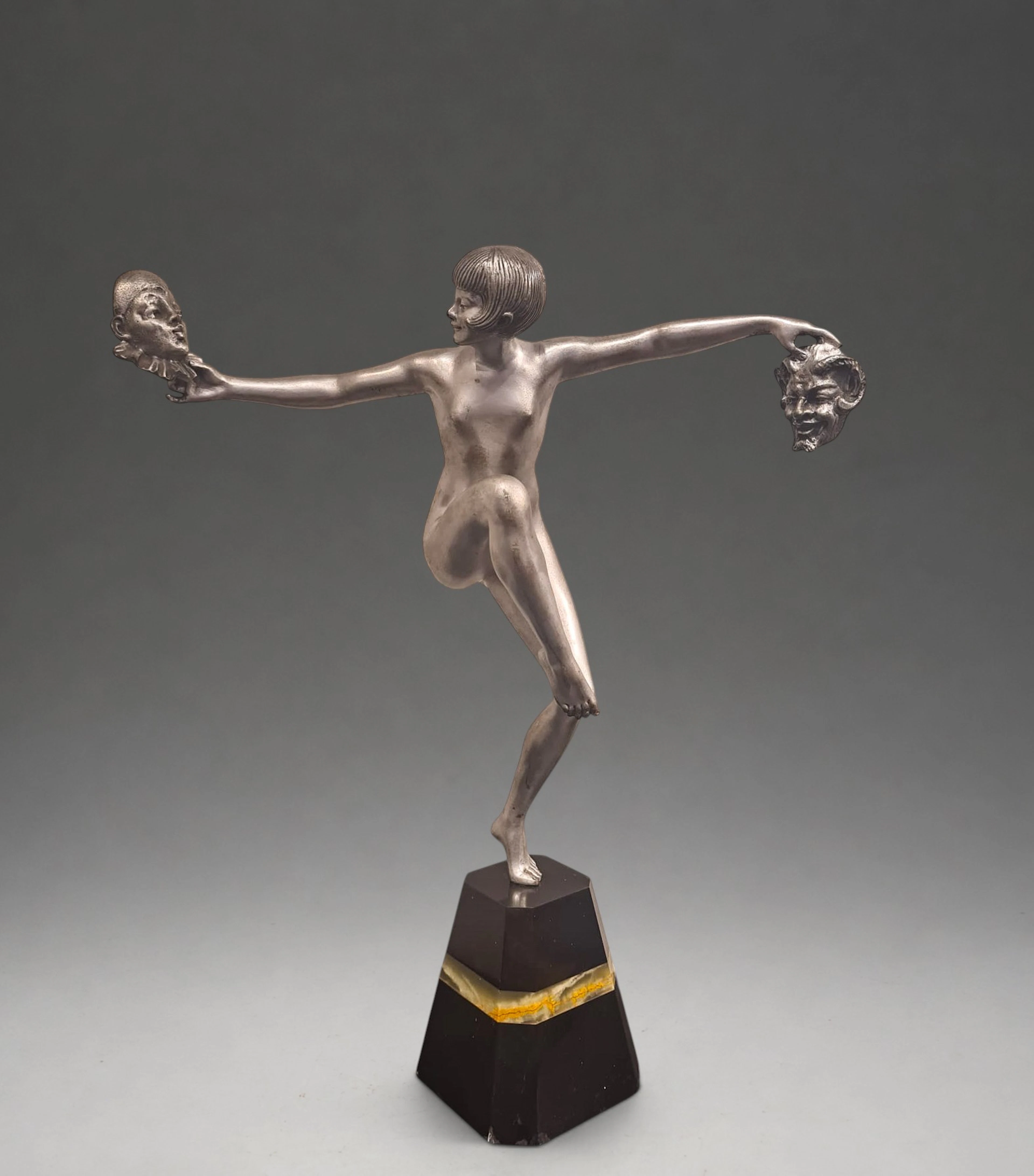 "Danseuse aux masques" In silver-plated bronze. Henri Désiré Grisard