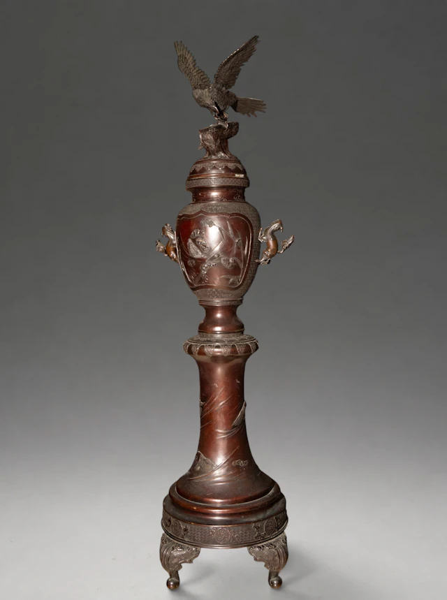 Monumental bronze incense burner decorated with birds and dragons