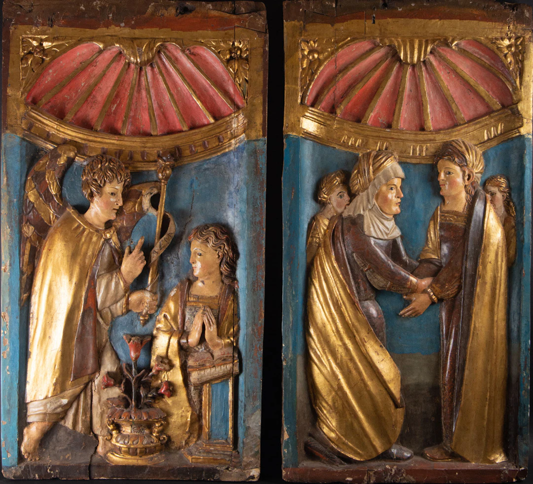 Important couple of Reliefs representing The Annunciation and the
