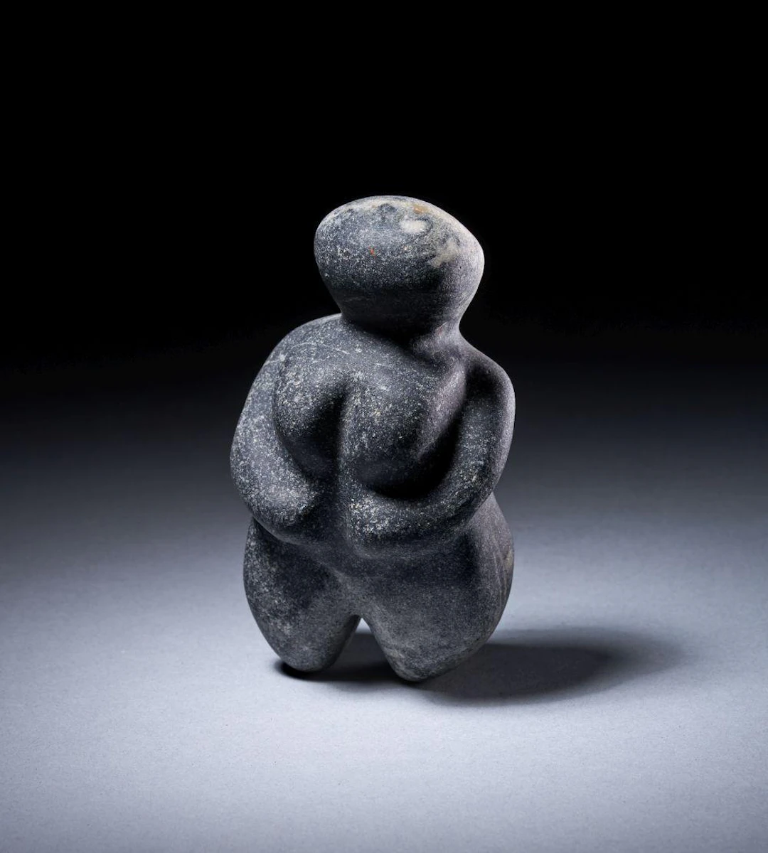 Neolithic steatopygic female figure in marble, Eastern Europe / Mediterranean