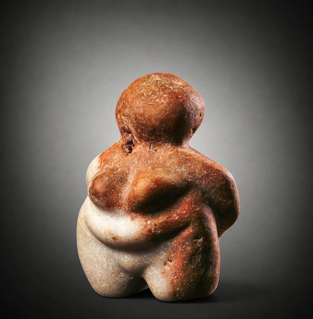 Neolithic steatopygous female figure in bicoloured marble, Mediterranean