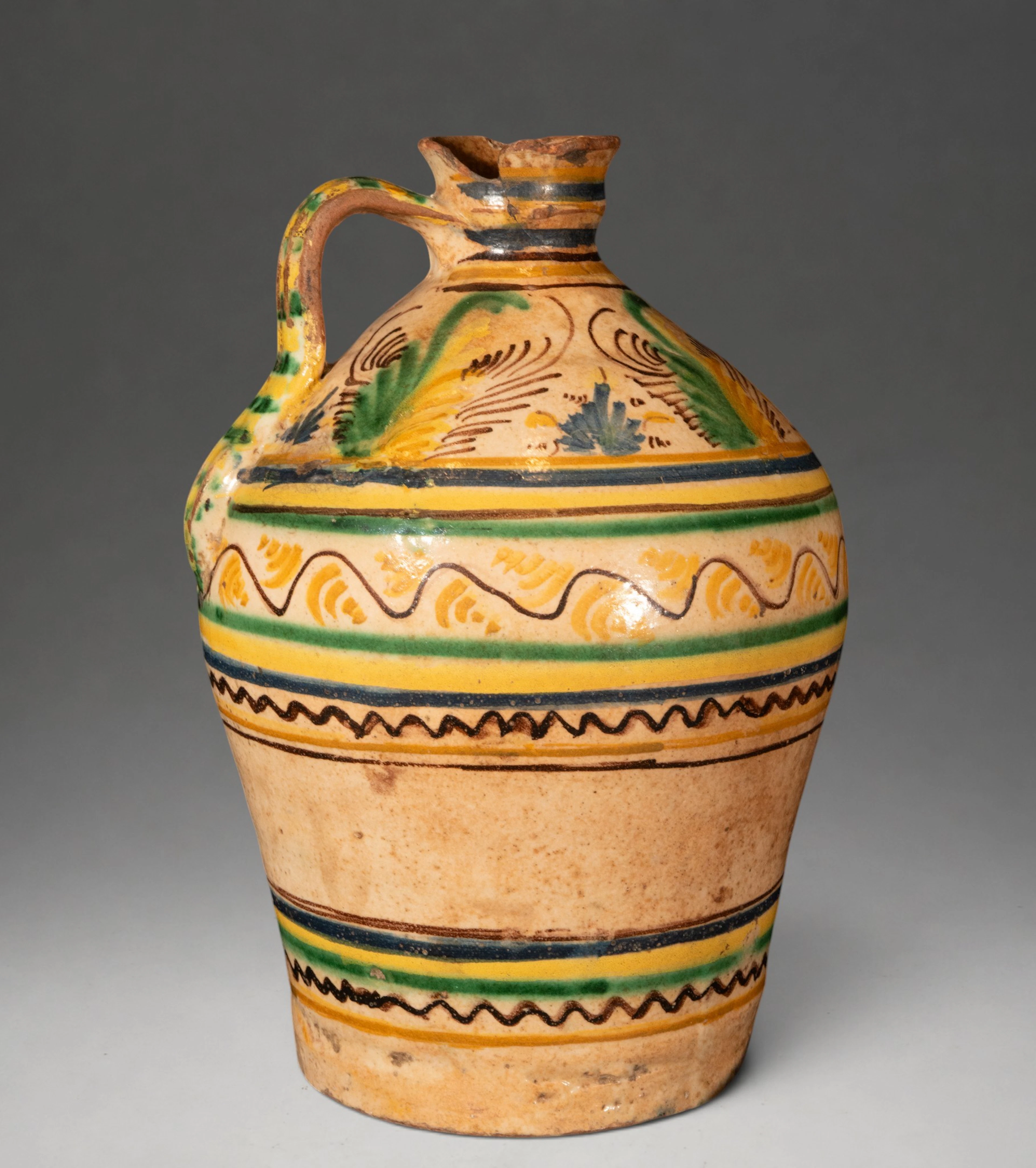 TERUEL CERAMICS - Jug with polychrome geometric and vegetal decoration
