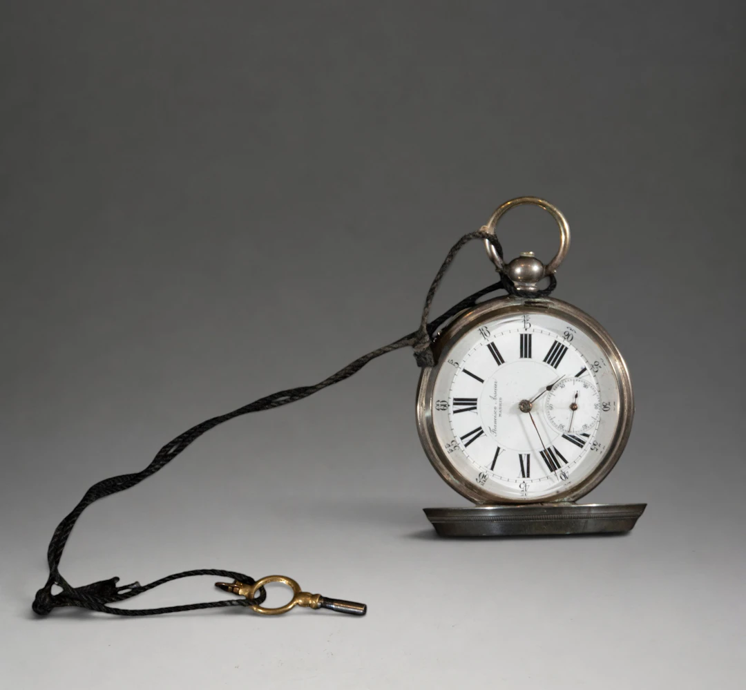 Pocket watch with key and side second hand