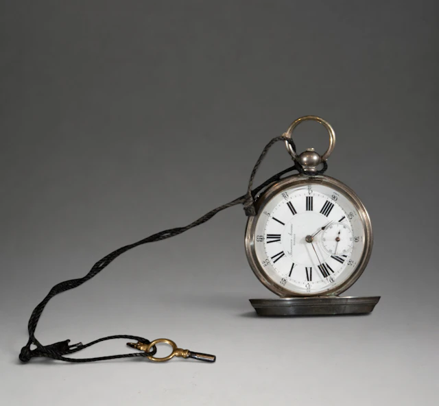 Pocket watch with key and side second hand