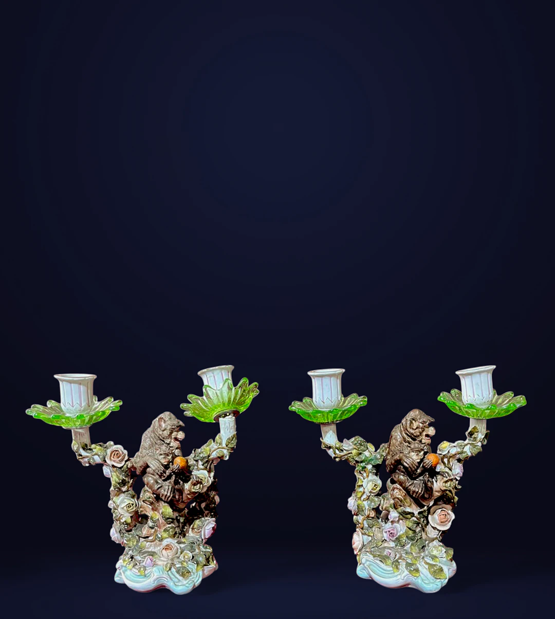 Pair of porcelain candlesticks with chimpanzees, Central Europe, 19th century