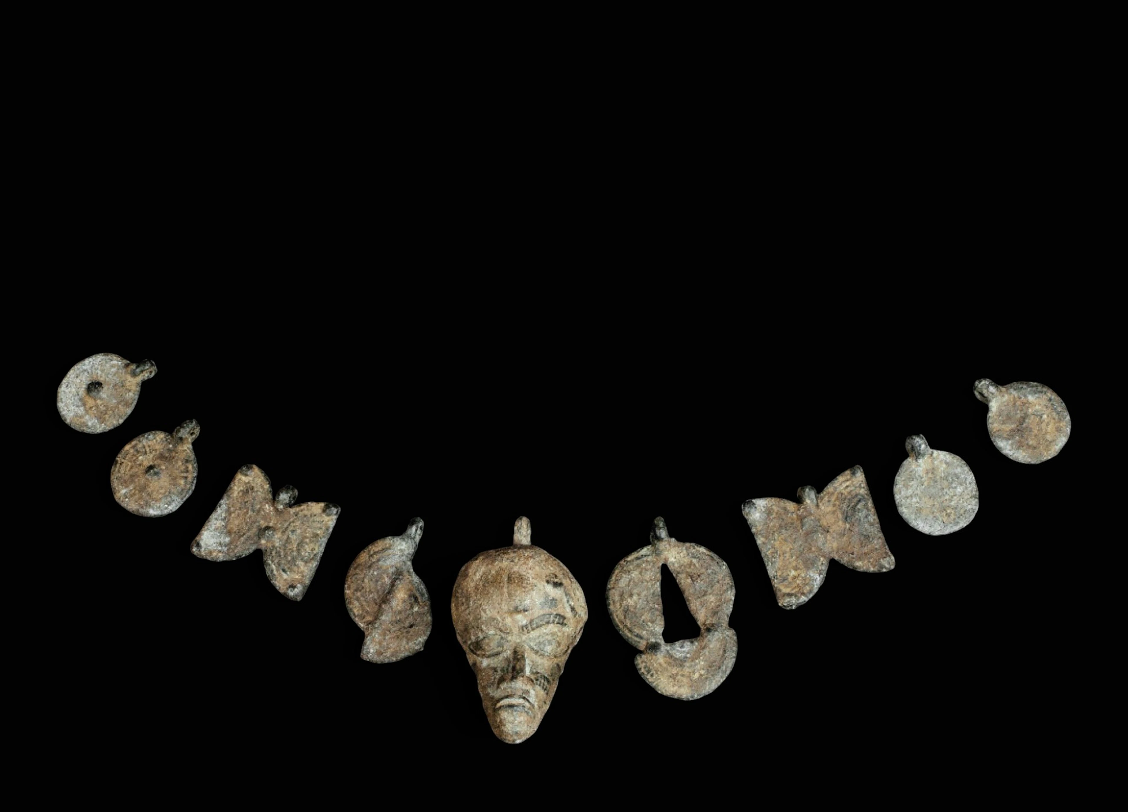 Eight-element necklace with central face, Dan, Ivory Coast, 19th-20th centuries
