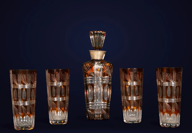 Liquor decanter and 4 whiskey glasses in Bohemian crystal and silver