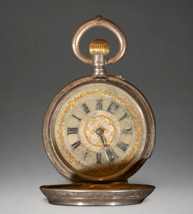 Pocket watch with ornate dial