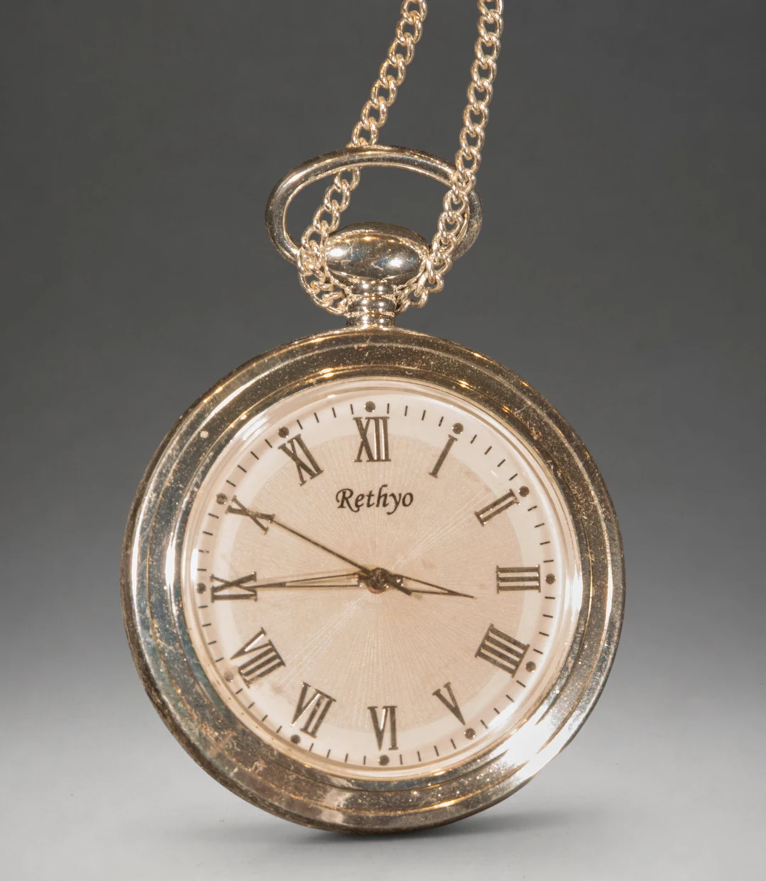 Rethyo pocket watch with chain and Roman numerals