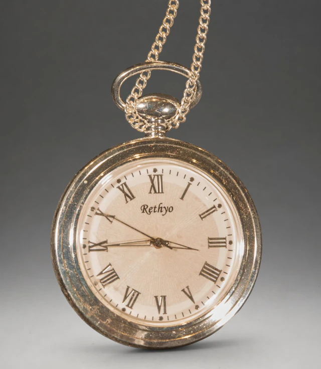 Rethyo pocket watch with chain and Roman numerals