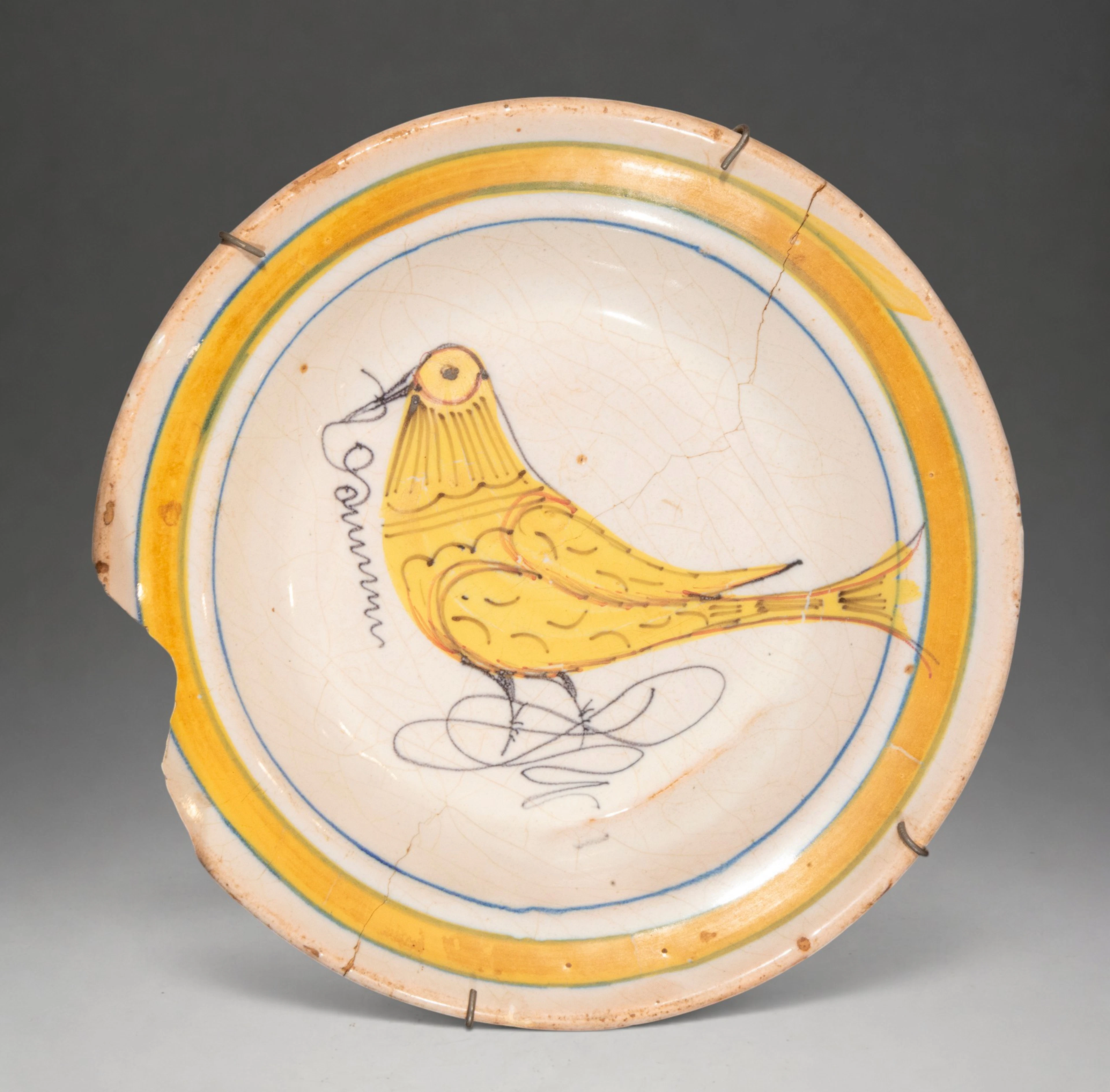 MANISES CERAMICS - Plate with bird decoration in yellow