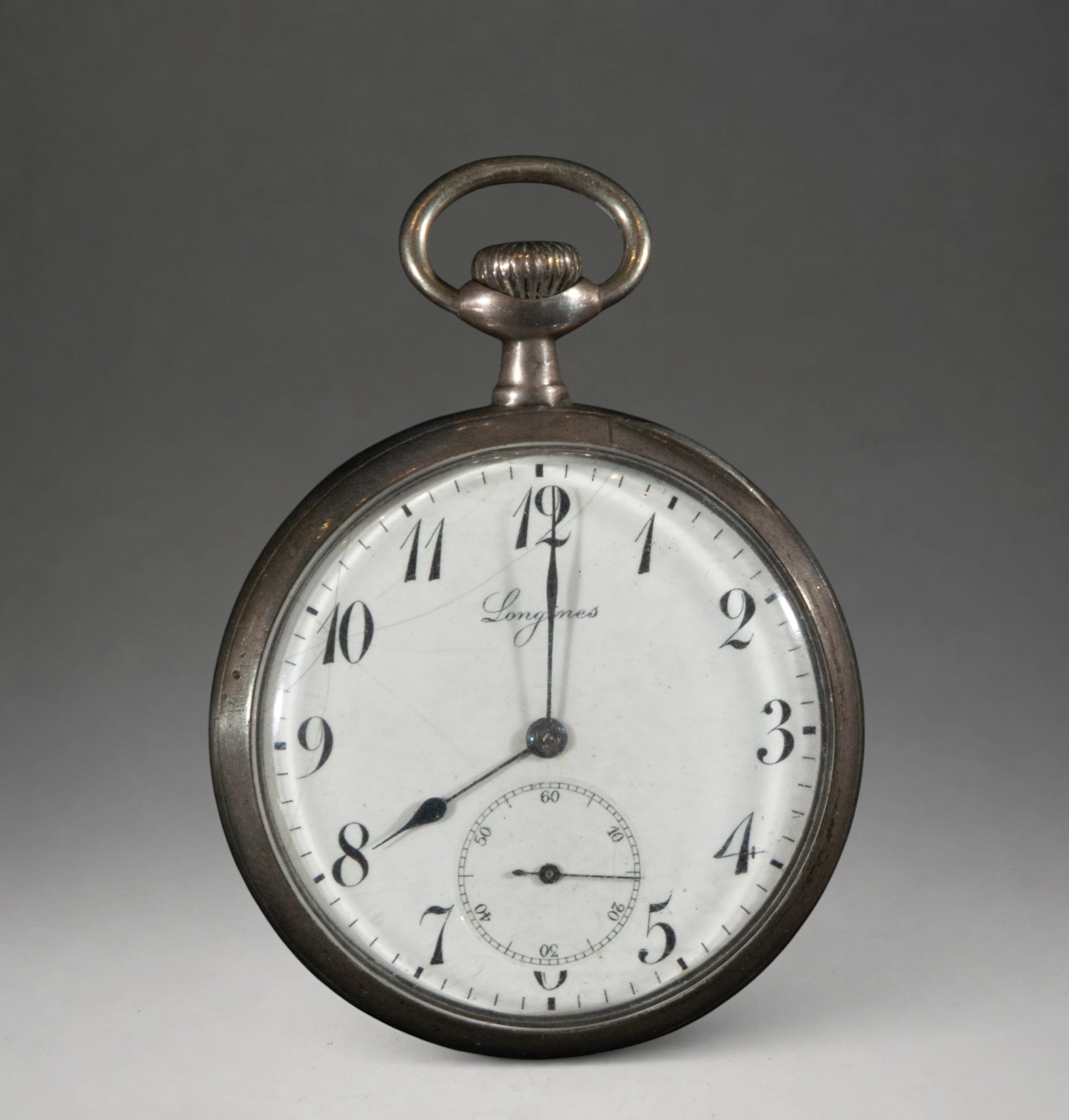Pocket watch with Arabic numerals and second hand