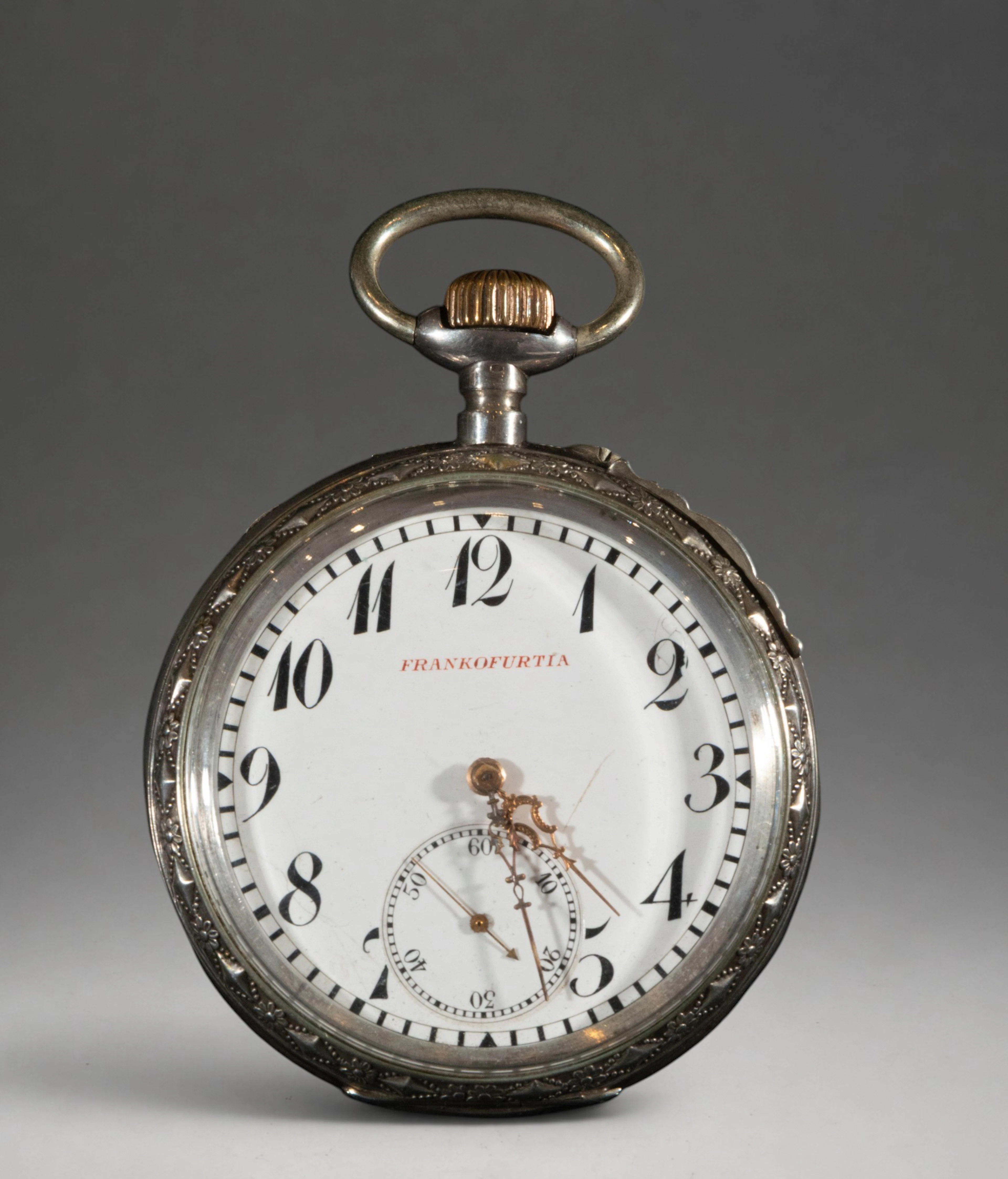 Pocket watch with white dial and Arabic numerals