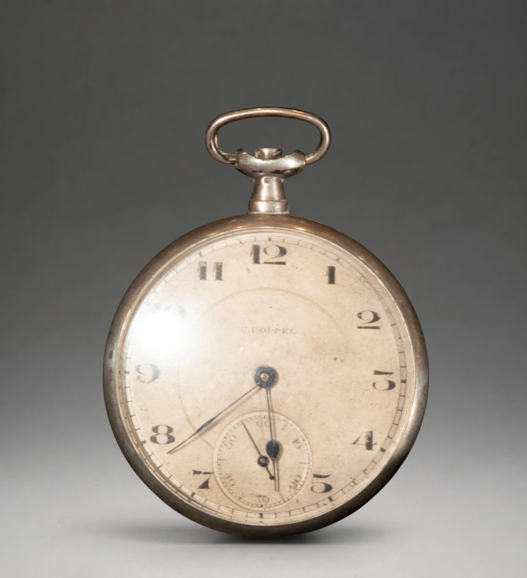 Pocket watch with Roman numeral dial