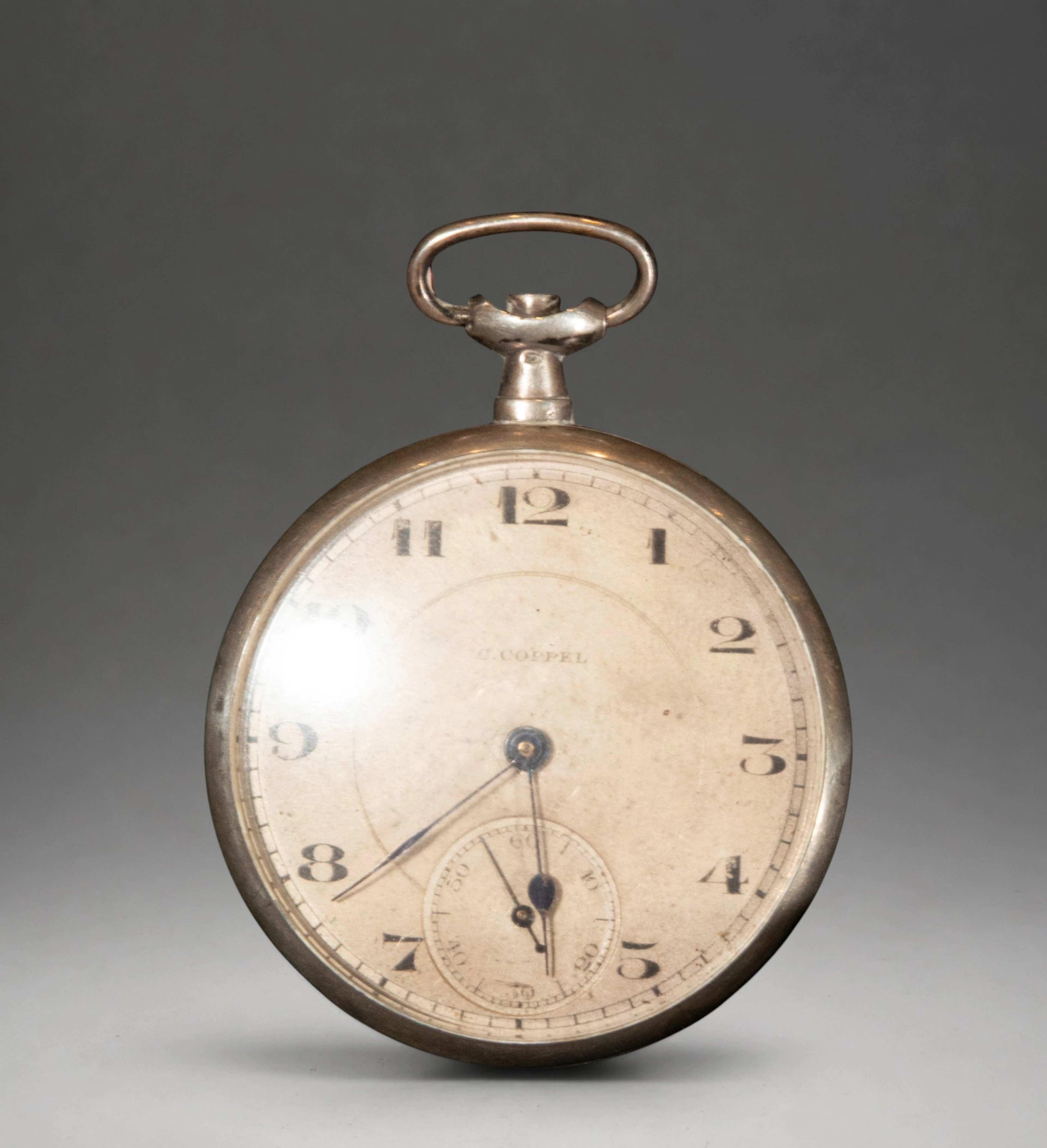 Pocket watch with Roman numeral dial