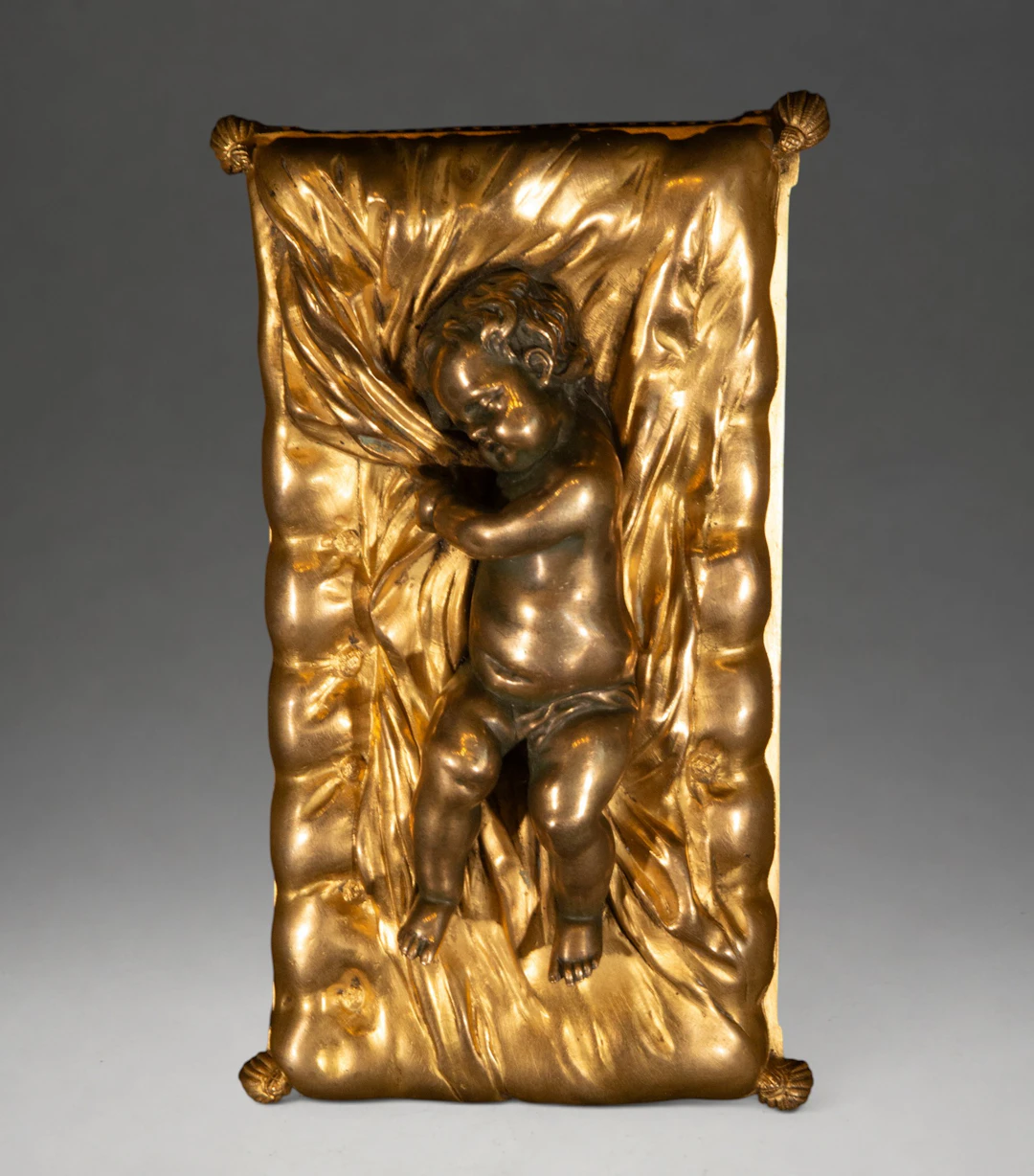 Infant Jesus asleep on a gilt bronze bed – French School, Empire style