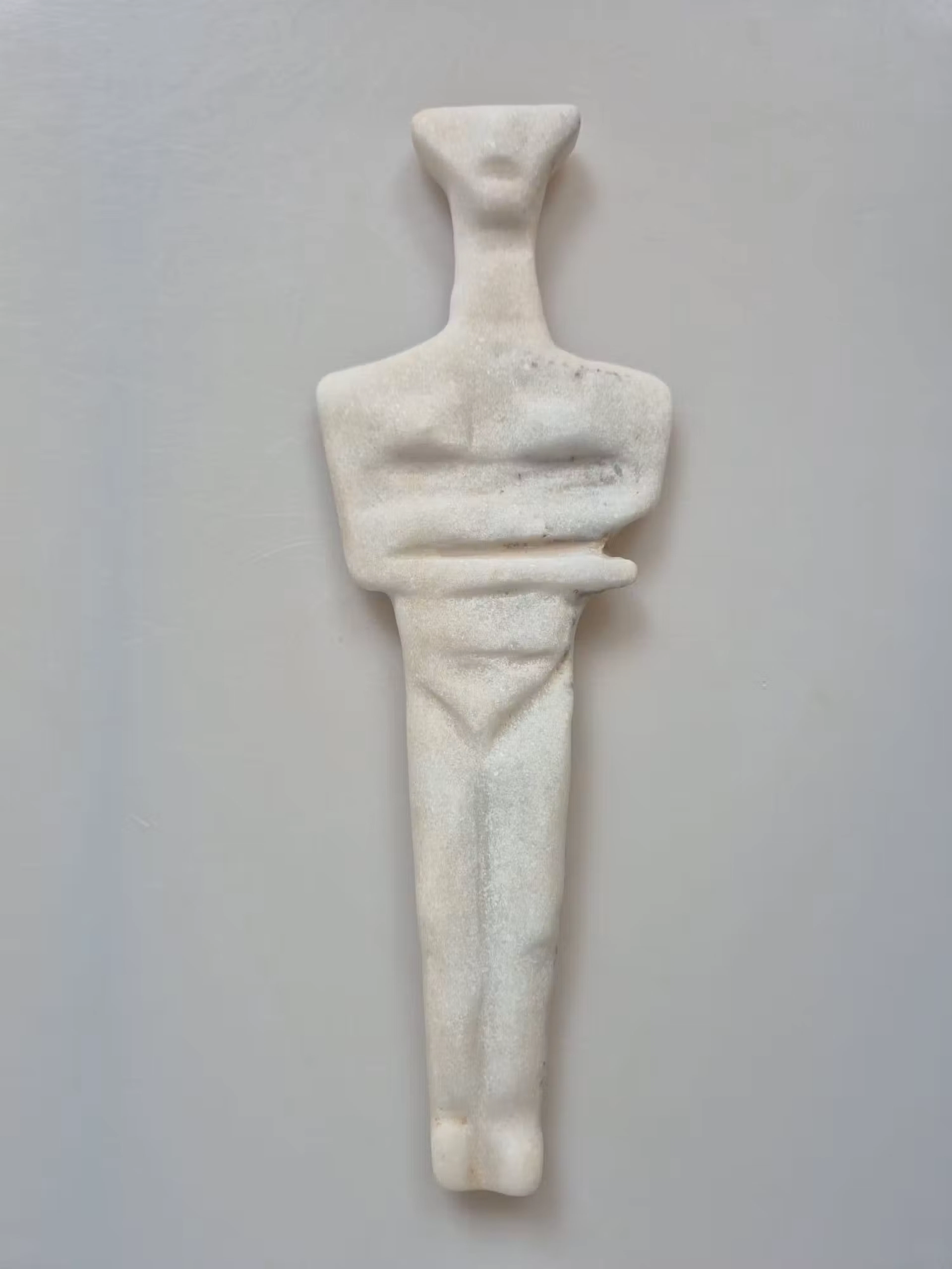 Neolithic steatopygous female figurine in white marble, Eastern Europe