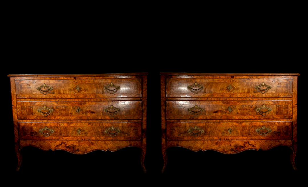 Pair of Italian chests of drawers in walnut and bronze, 18th century