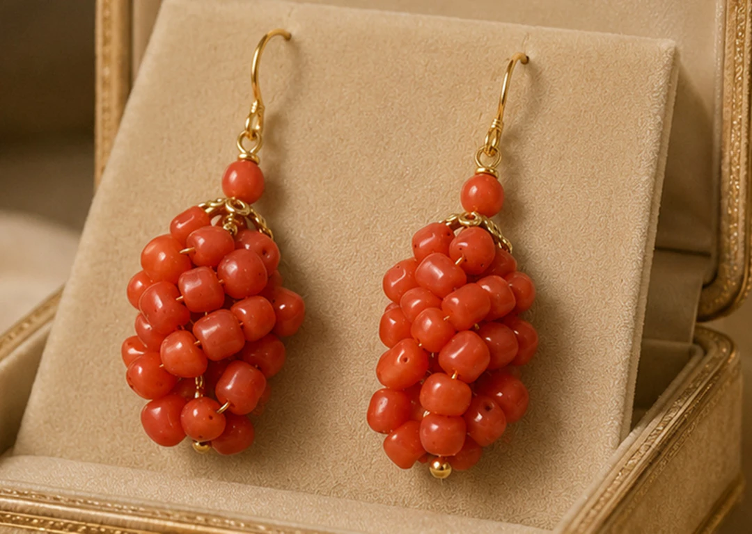 Elegant vintage earrings made of natural Mediterranean coral. Hallmarked.