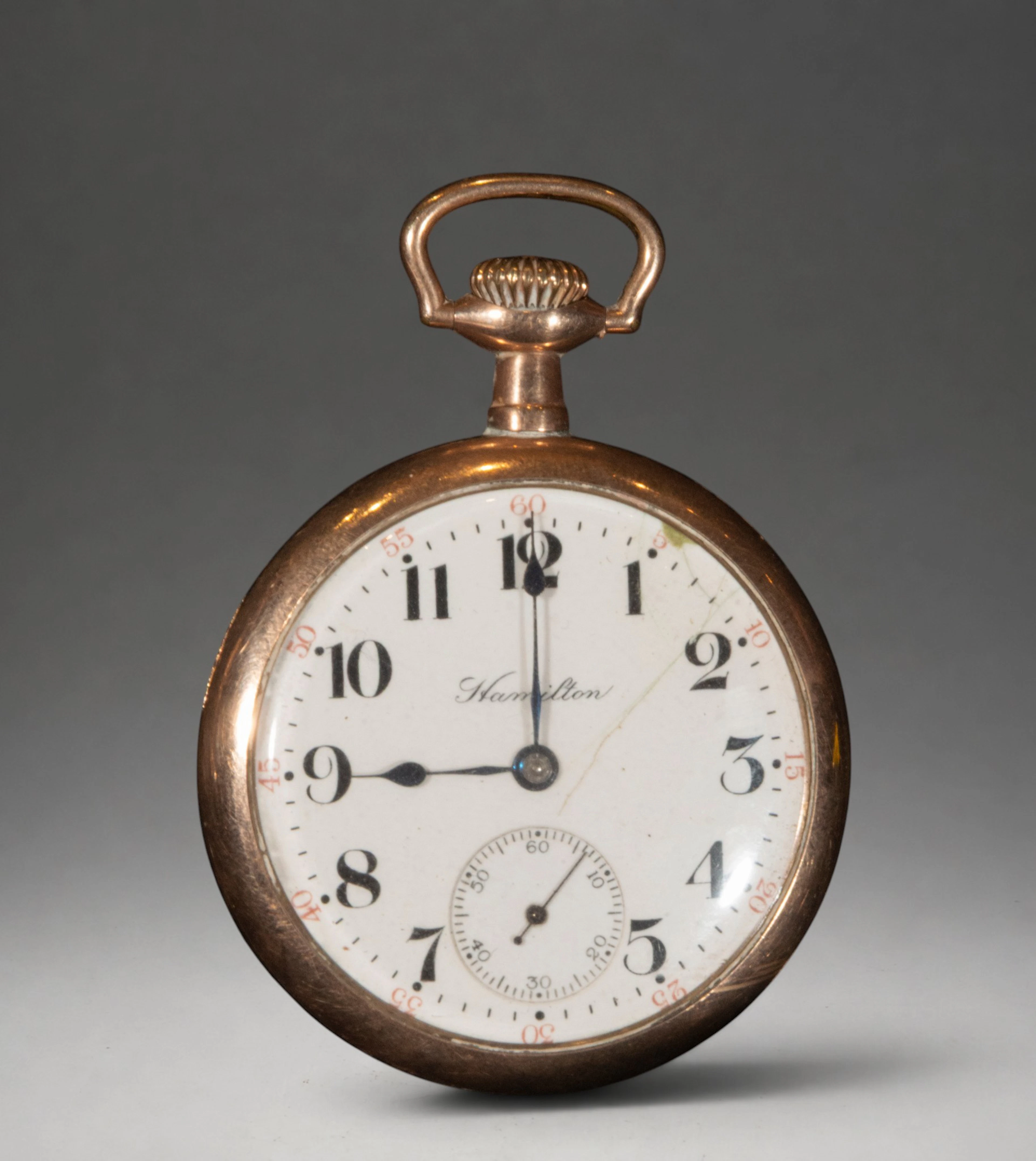 Pocket watch with white dial and second hand