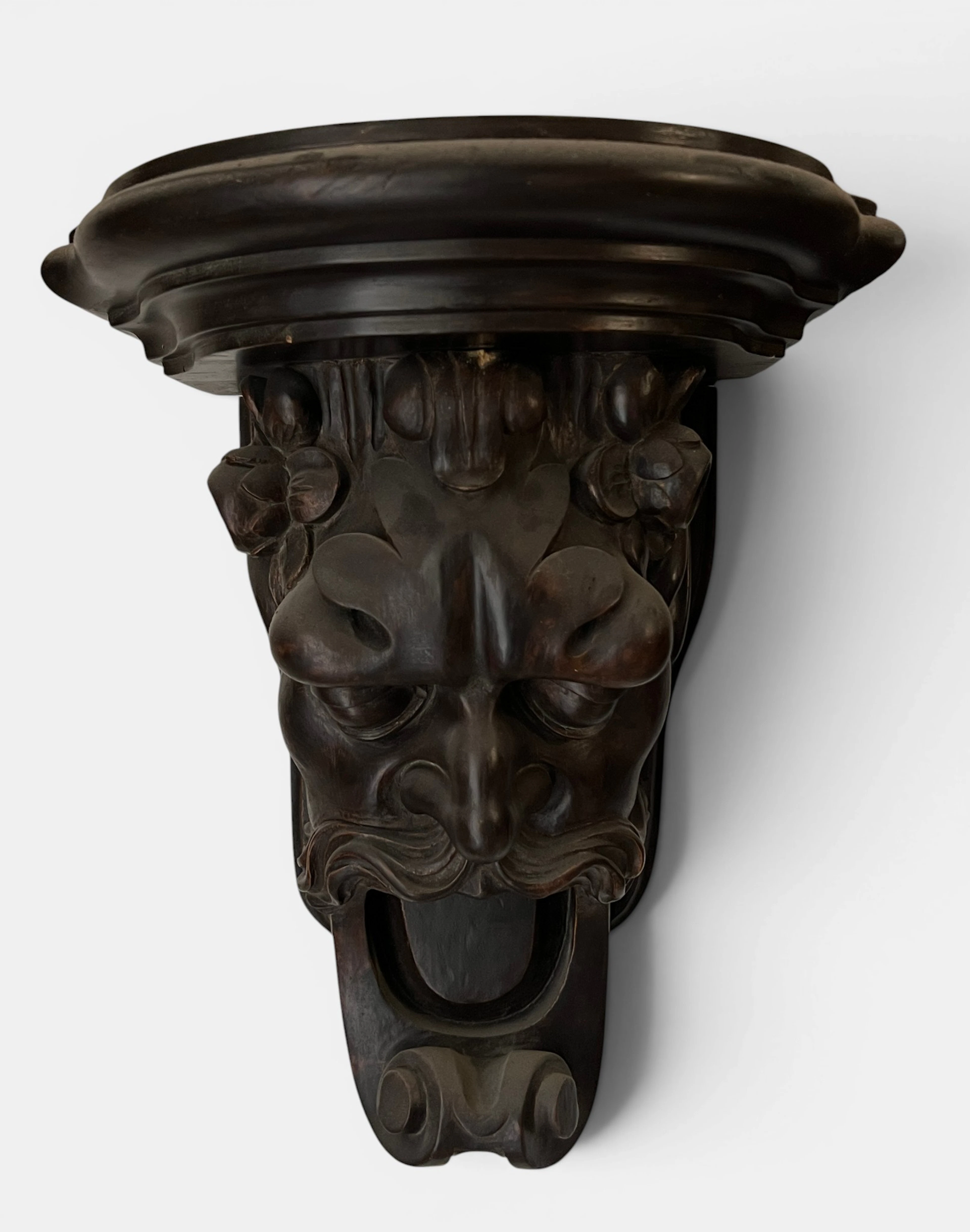 Black Forest wall bracket with faun in wood, 20th century
