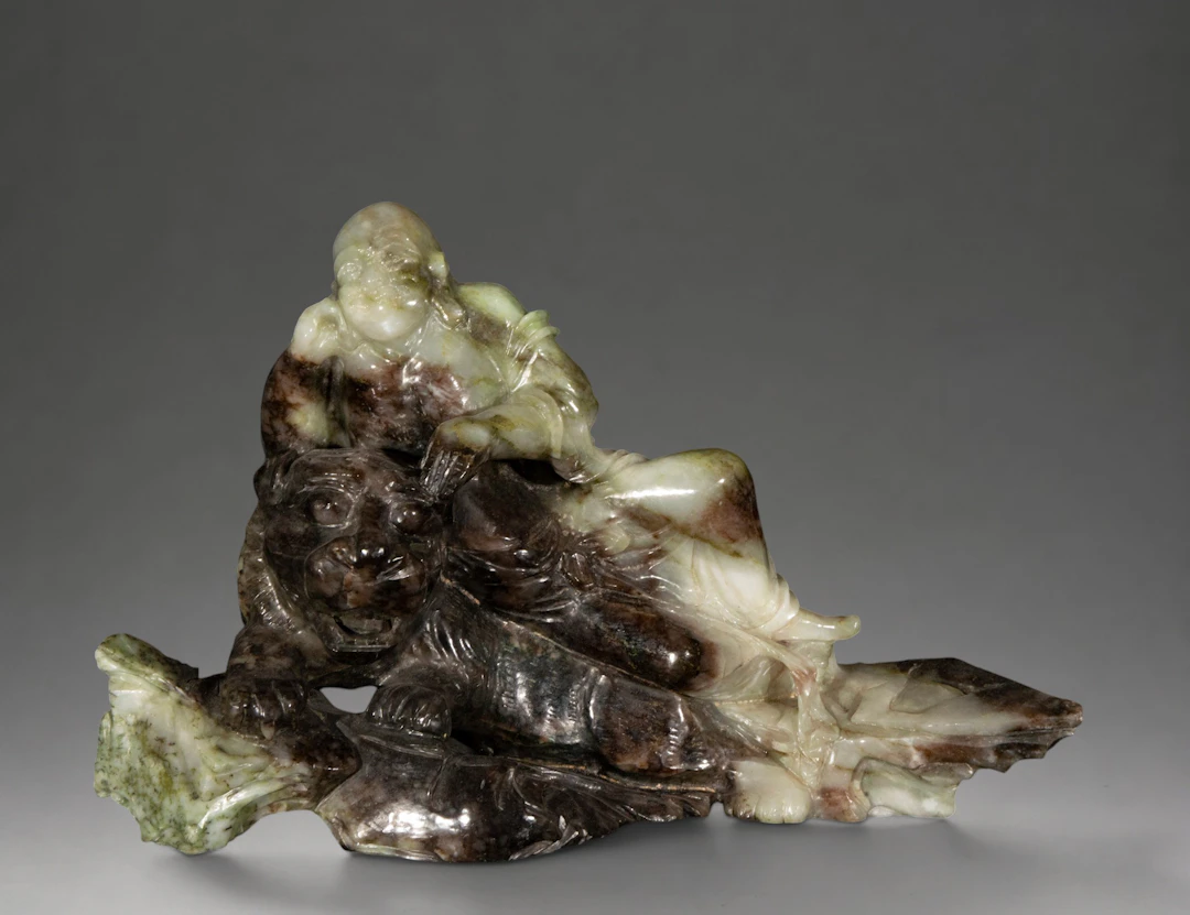 Buddha reclining on a Buddhist lion – China