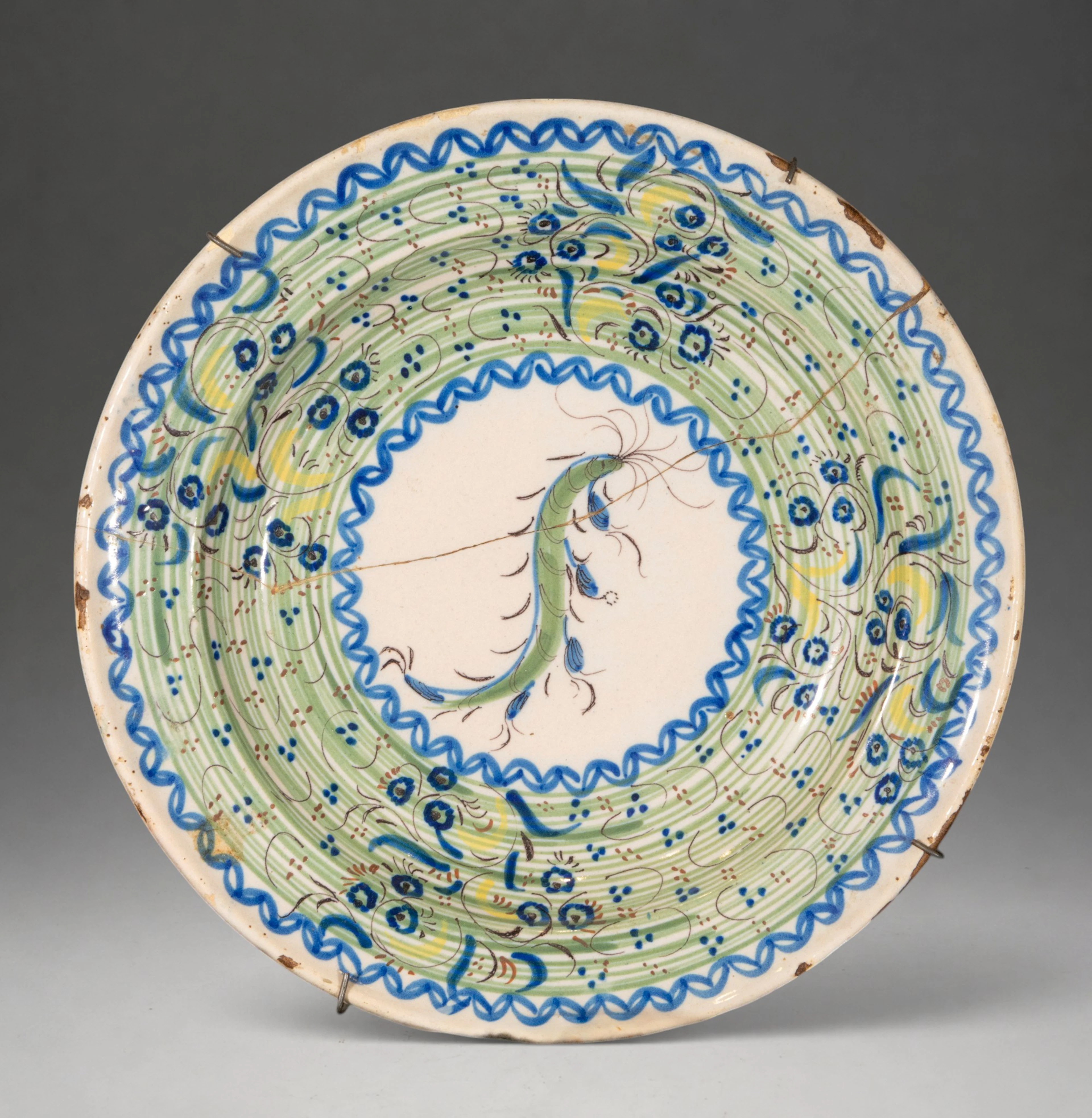 MANISES CERAMICS - Plate with polychrome plant decoration and central medallion