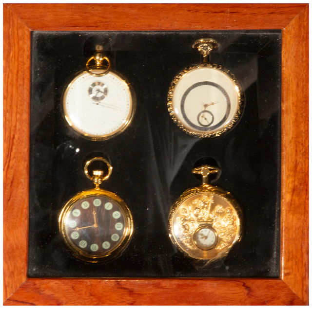 Set of four pocket watches with varied decoration