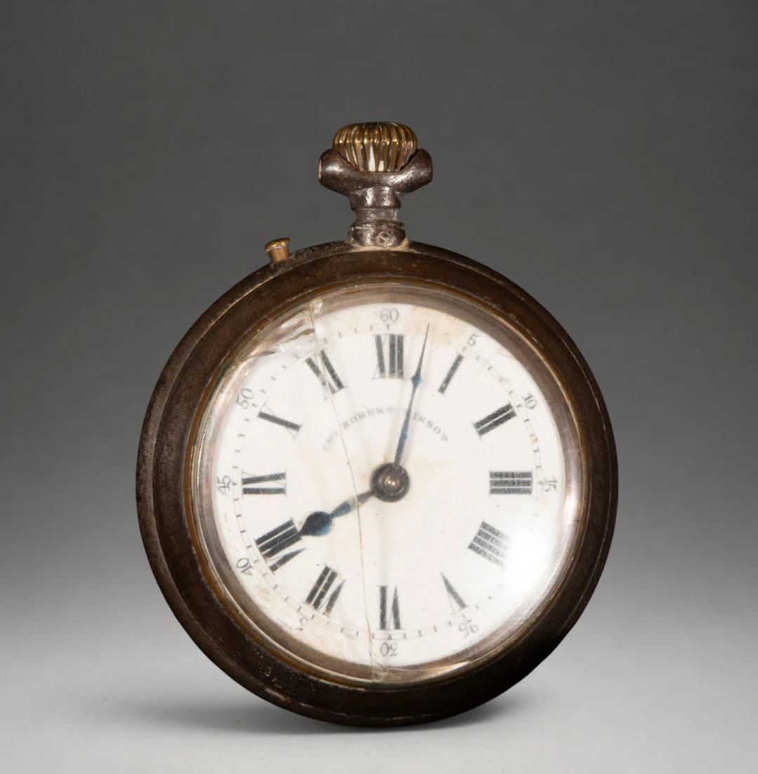 Pocket watch with white dial and Arabic numerals