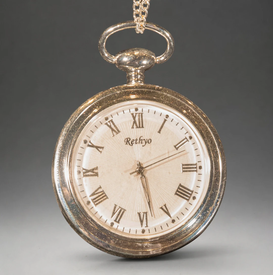 Rethyo pocket watch with Roman numerals and chain