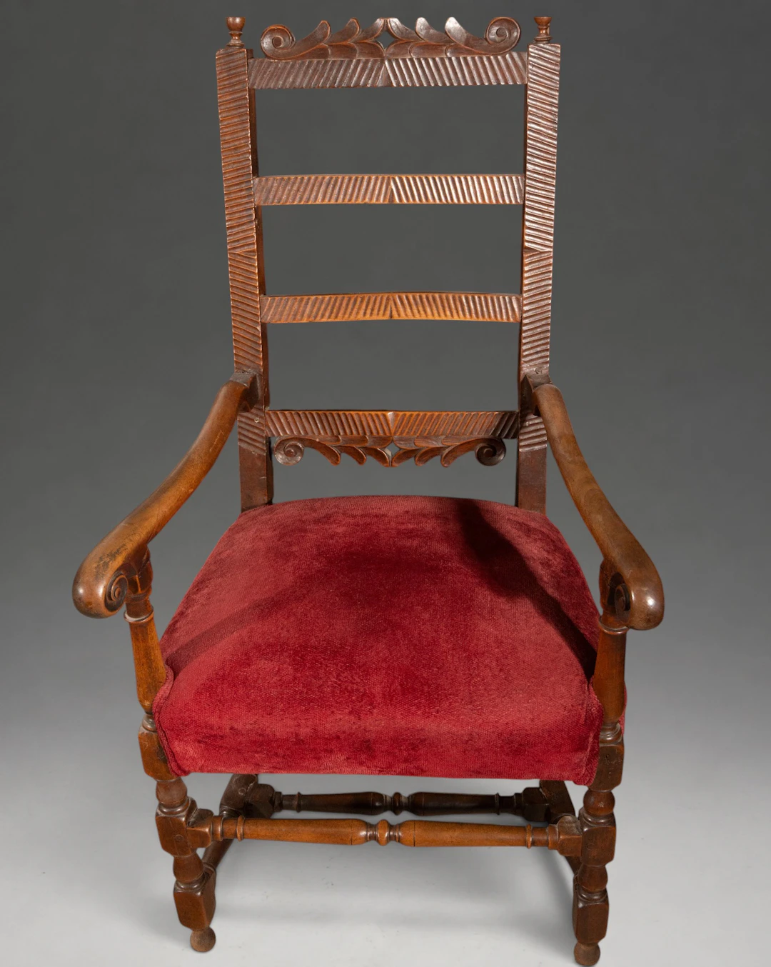 Carved wooden armchair with openwork back – 17th century