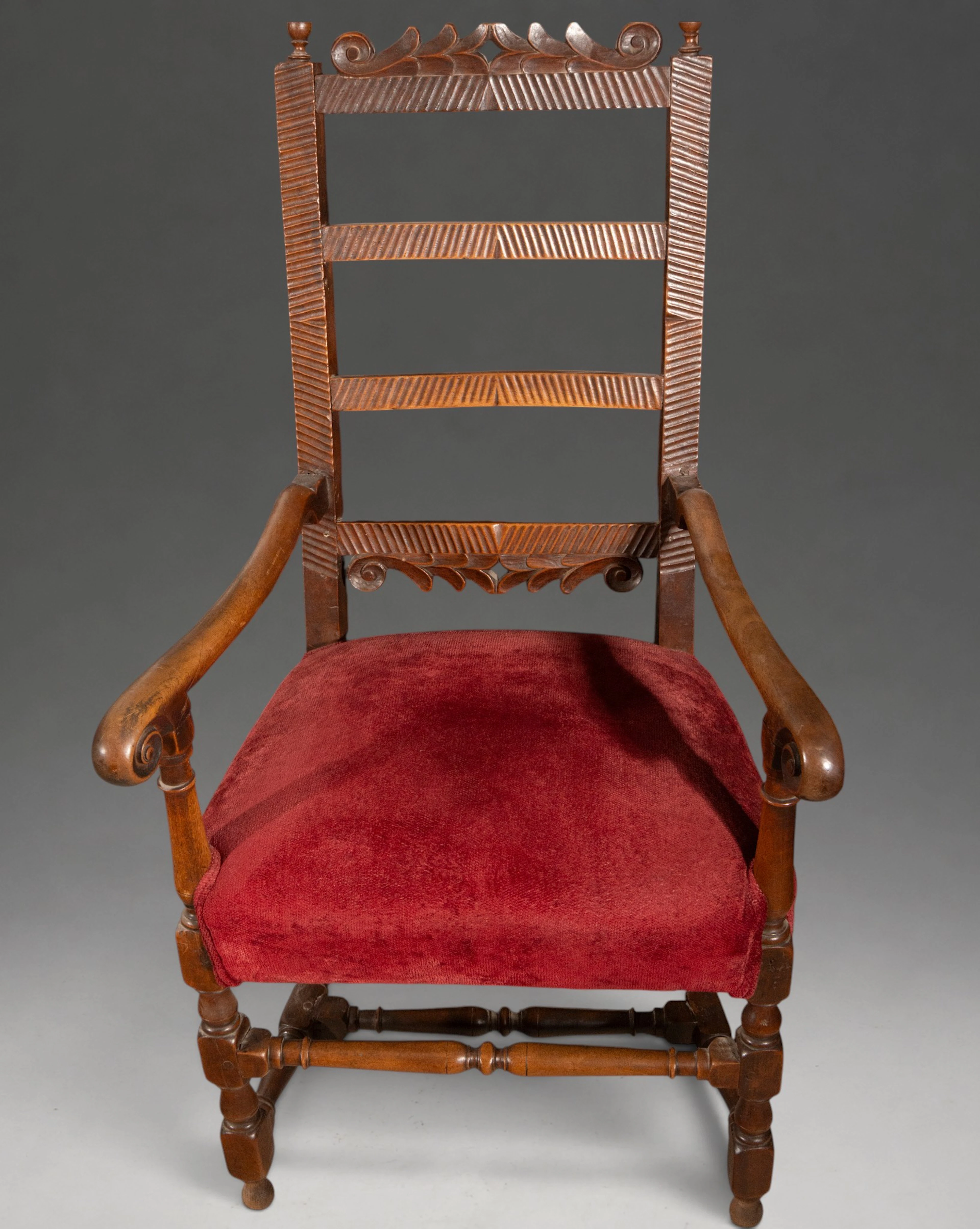 Carved wooden armchair with openwork back – 17th century
