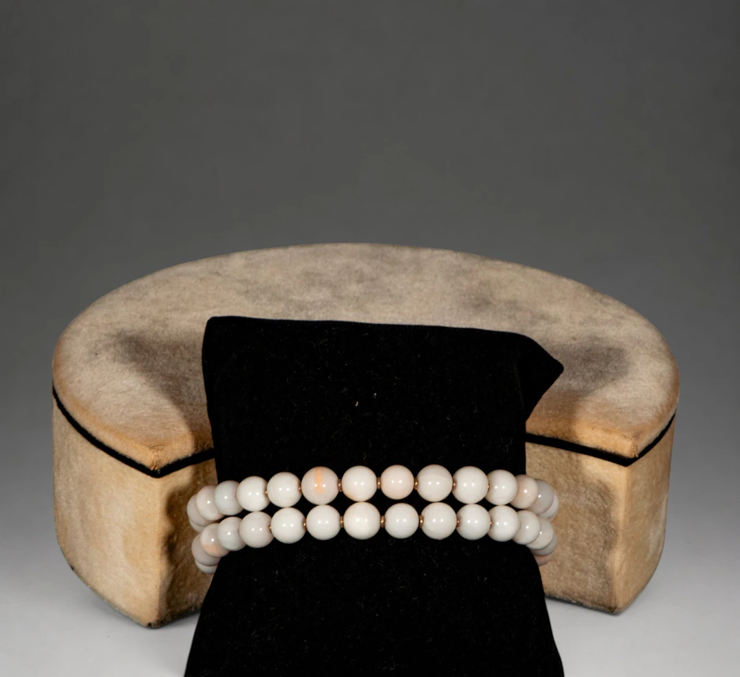 Pair of bracelets with angel skin coral beads