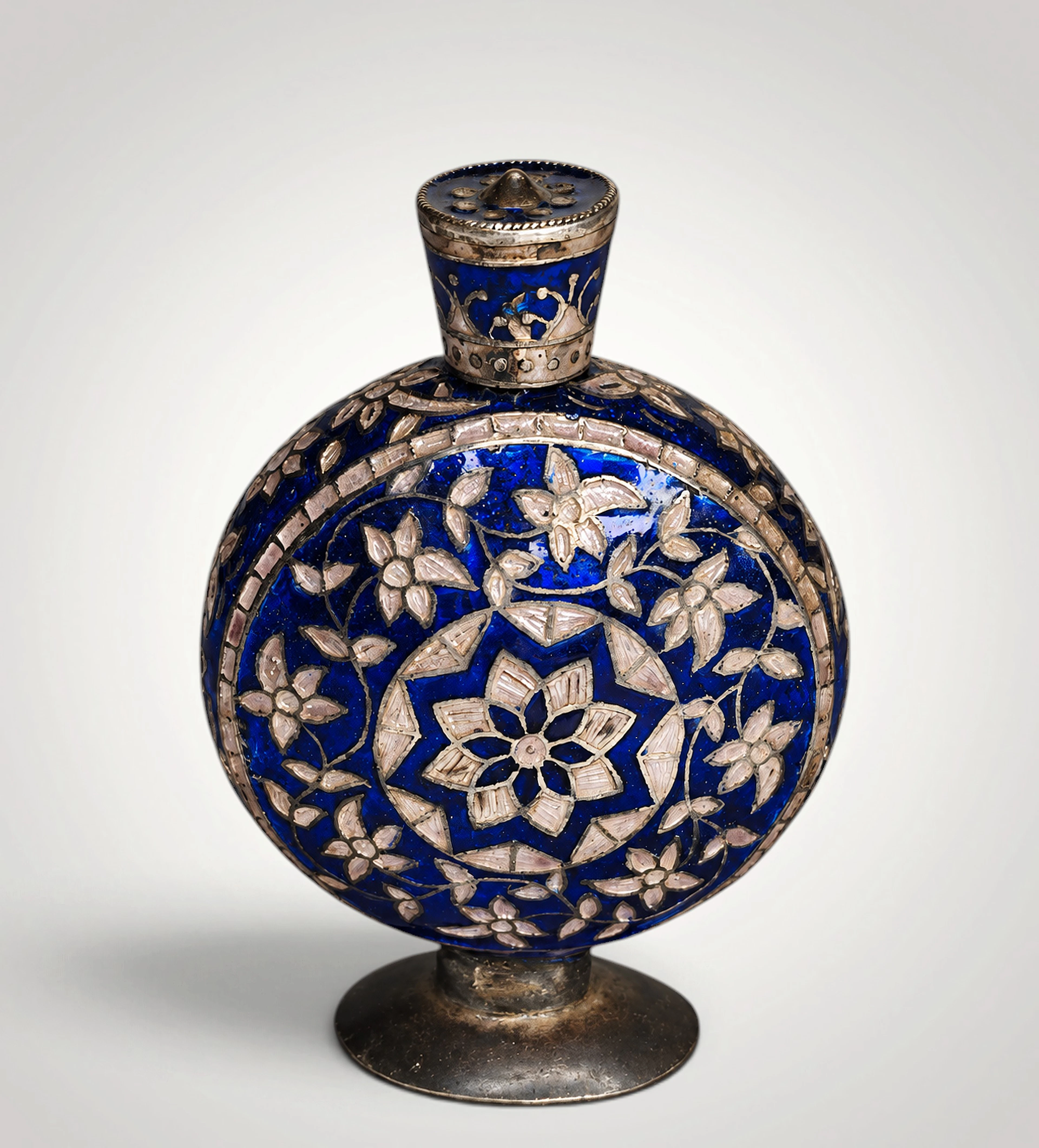 Indian silver and enamel perfume bottle. Height: 9 cm